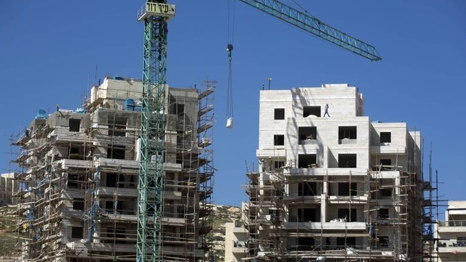 A housing construction site in the Israeli settlement of Har Homa in east Jerusalem, is pictured on February 27, 2013. EU foreign policy chief Catherine Ashton is pushing for comprehensive guidelines to introduce separate labelling for products from Israeli settlements in the West Bank, a newspaper reported on Tuesday.