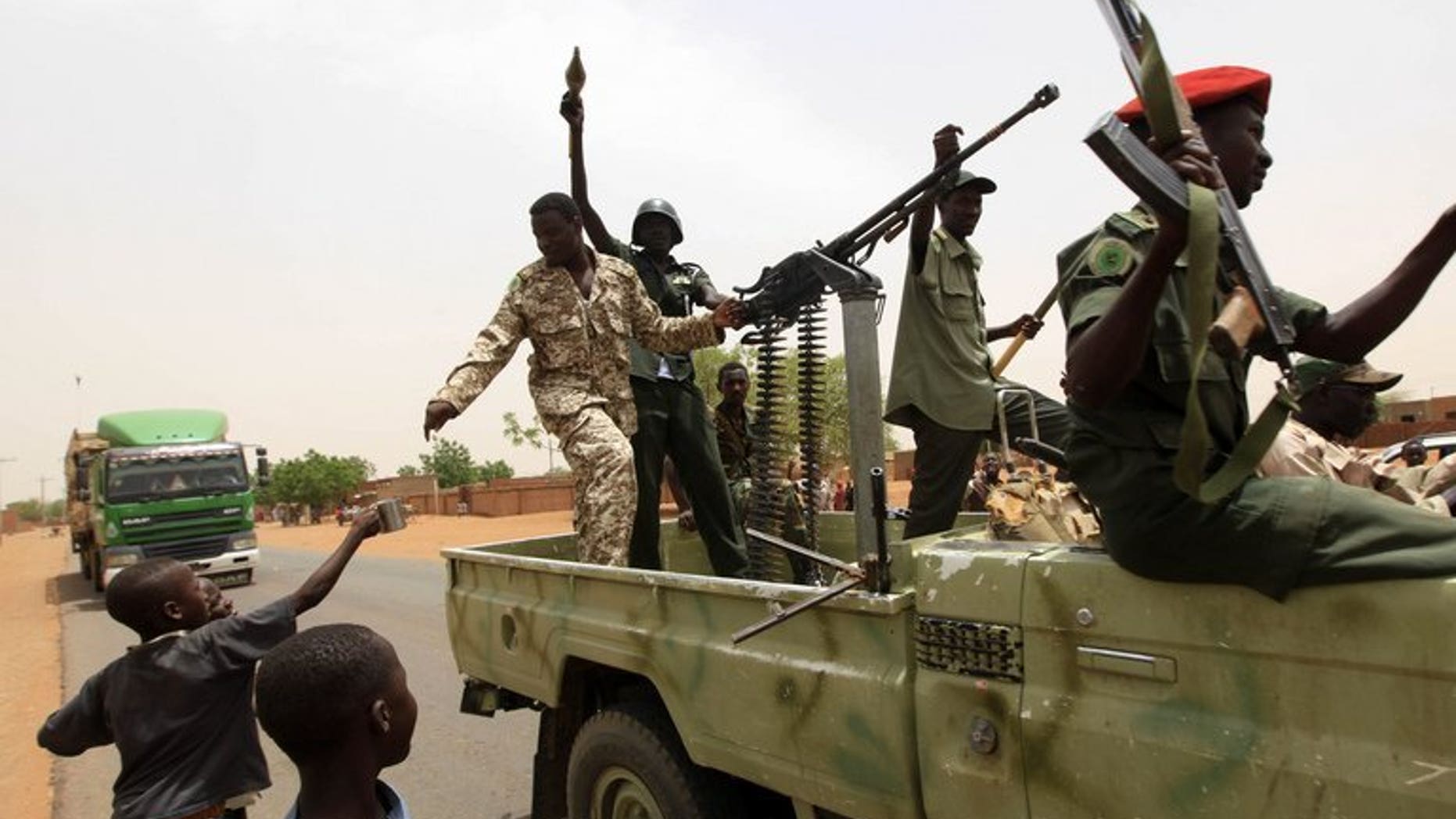 Sudanese army soldiers pictured in Abu Kershola in South Kordofan after capturing the town from Sudan Revolutionary Front rebels, May 28, 2013. Sudanese rebels clashed with troops in North Kordofan Wednesday, both sides said, days before a Khartoum deadline to halt South Sudan's oil exports over allegations it is backing the insurgents.