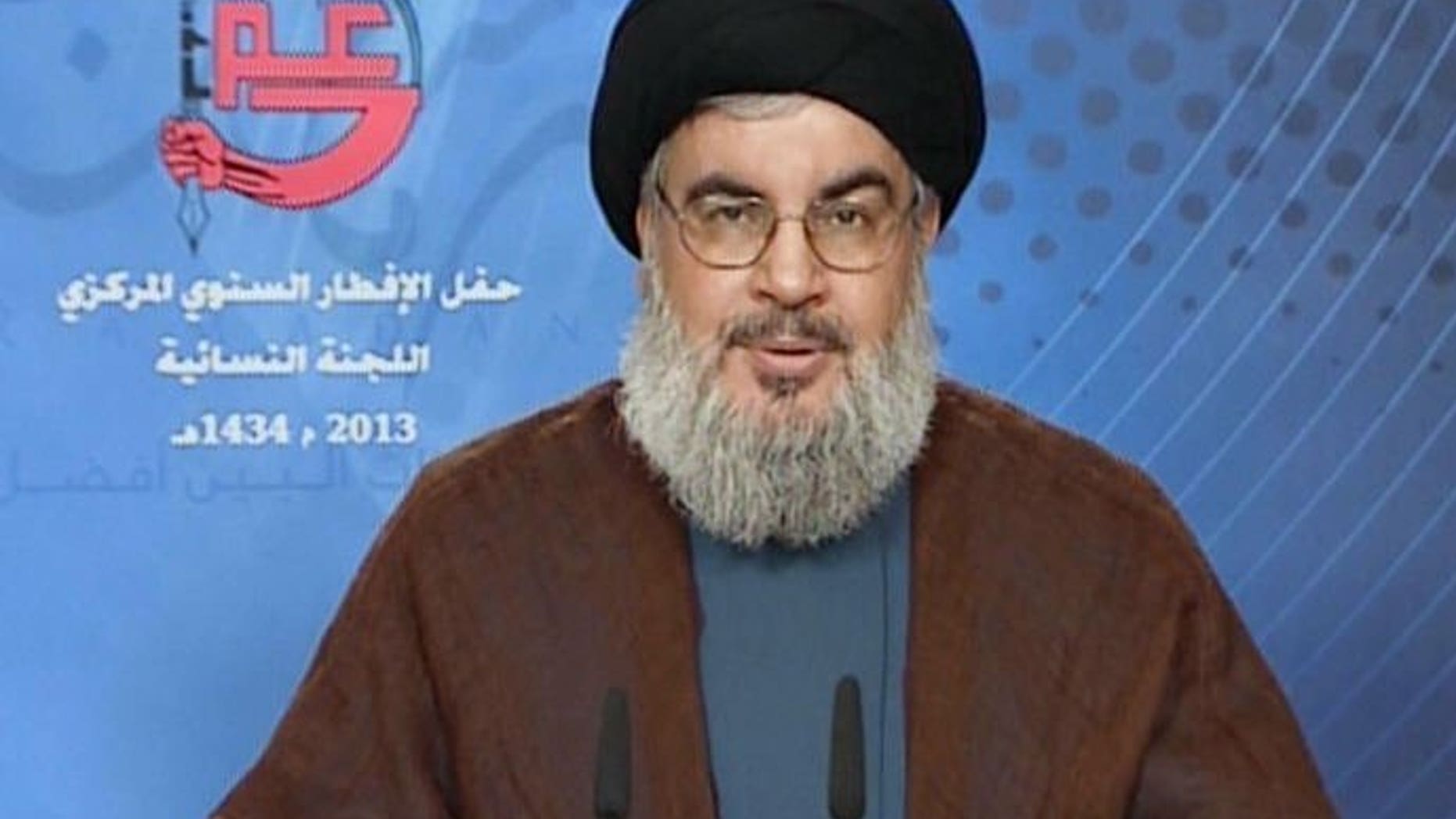 An image grab from Hezbollah's al-Manar TV shows Hassan Nasrallah, the head of Lebanon's militant Shiite Muslim movement Hezbollah, giving a televised address from an undisclosed location on July 24, 2013 in Lebanon.