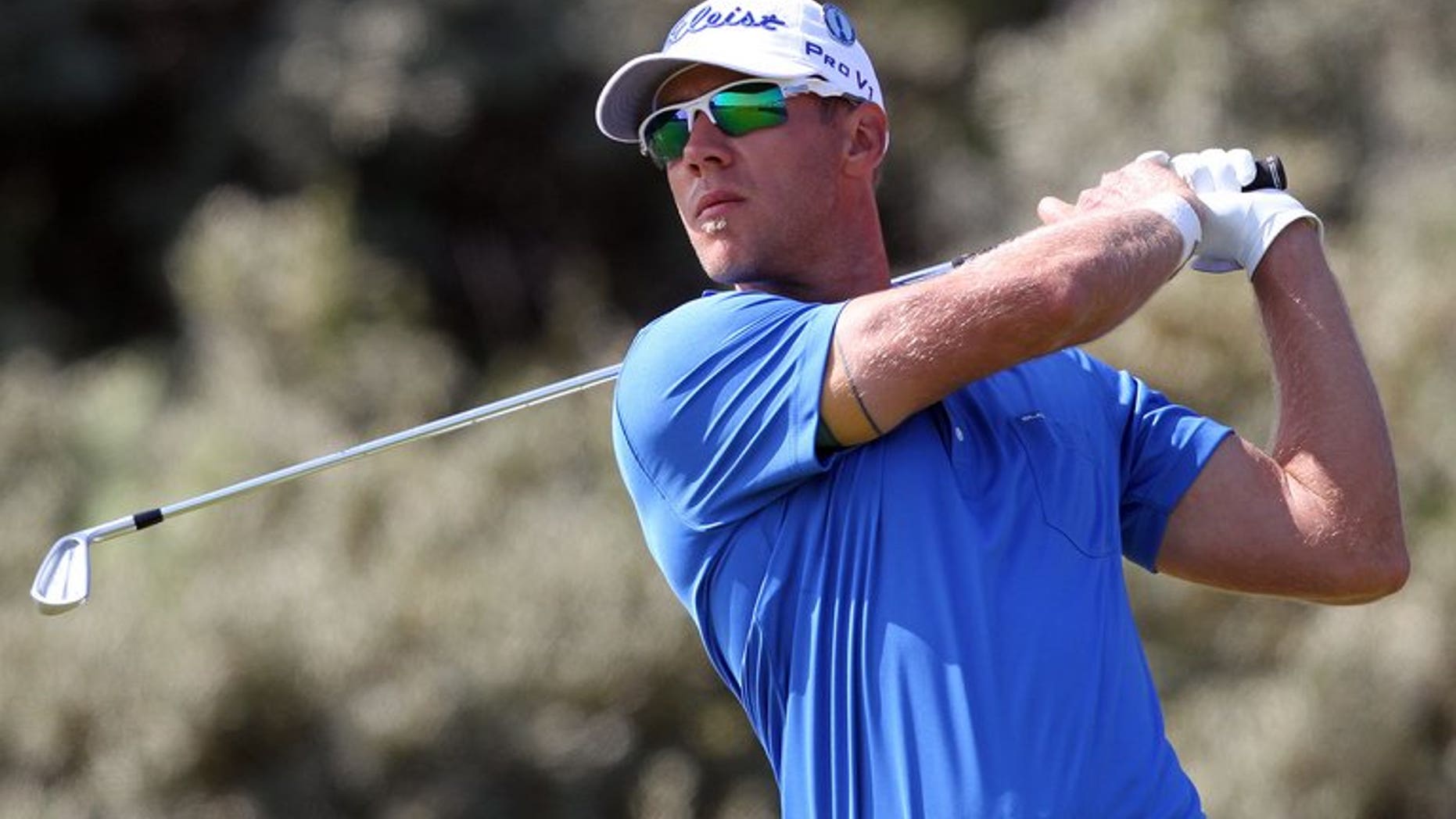 Canada's Graham DeLaet plays the third tee during the third round of the 2013 British Open Golf Championship at Muirfield golf course at Gullane in Scotland on July 20, 2013. DeLaet heads a healthy home challenge at the US PGA Tour's $5.6 million Canadian Open this week, seeking to put the trophy in Canadian hands for the first time since 1954.