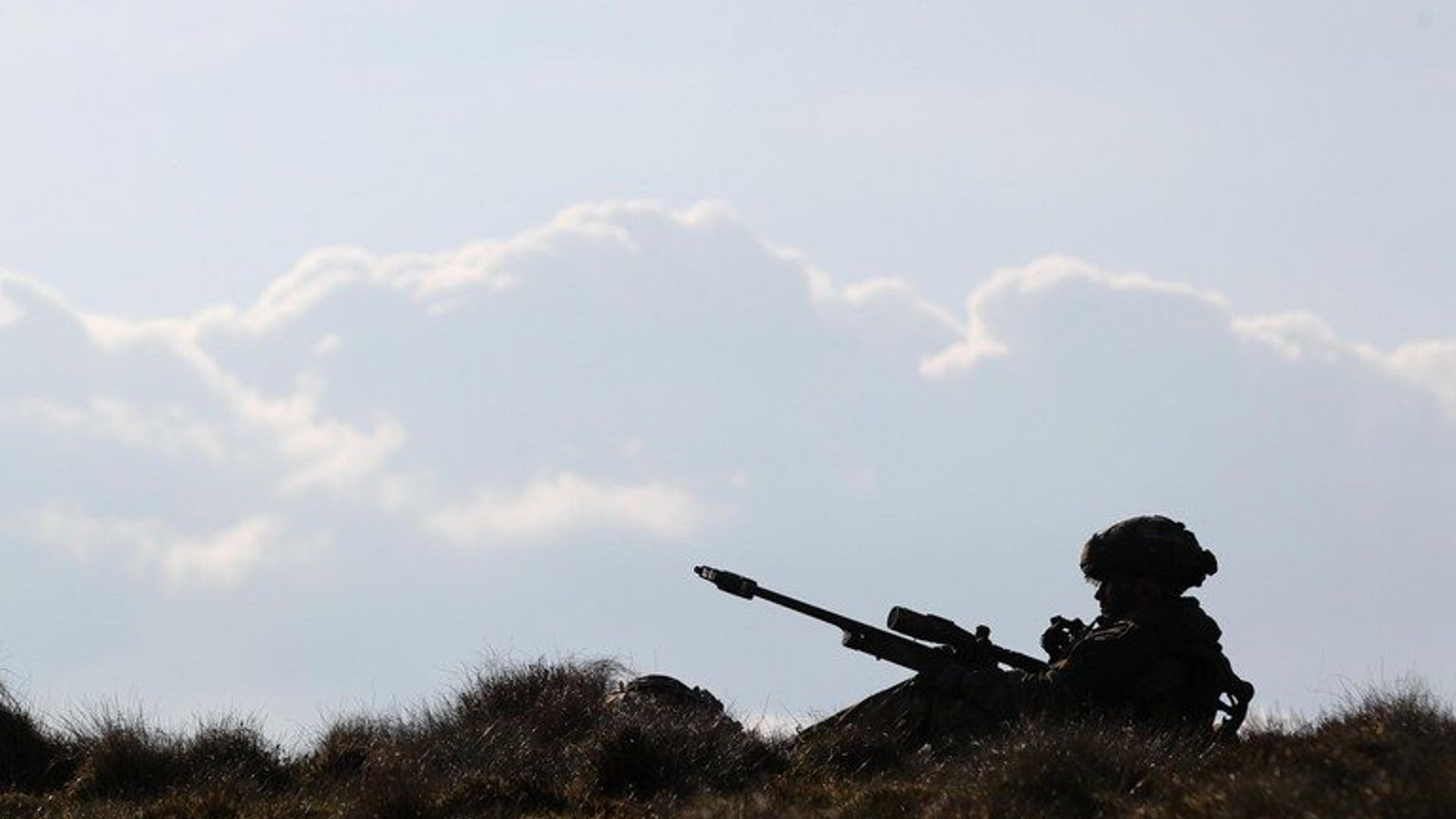 Illustration of a British army sniper. A military court is to sentence a special forces sniper who was convicted of unlawfully possessing a pistol and more than 300 rounds of ammunition.