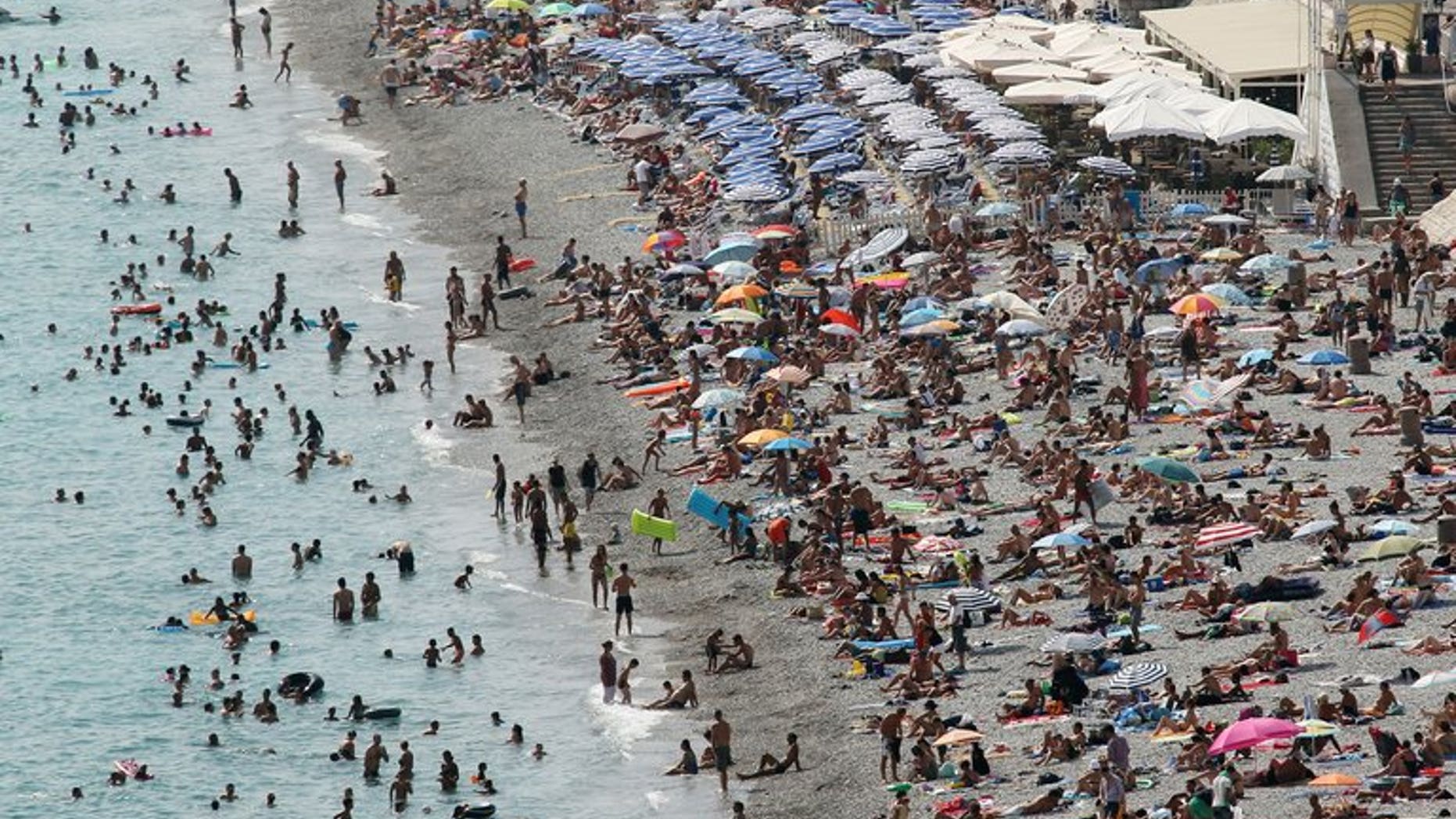 A picture taken on August 22, 2012 shows the beach in Nice, southeastern France. A 16-year-old British boy has disappeared while swimming off the southwestern coast of France and is unlikely to be found alive, maritime officials say.