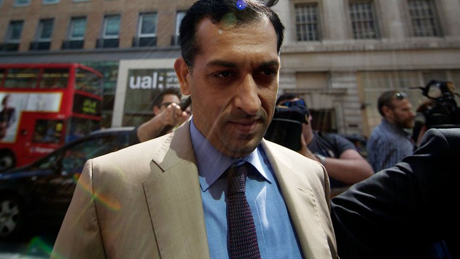 Godolphin trainer Mahmood al-Zarooni arrives for a disciplinary hearing at the British Horseracing Authority (BHA) in London on April 25, 2013. Godolphin are to face no further charges in relation to a doping scandal that saw one of the stable's leading trainers banned from racing for eight years, the British Horseracing Authority said.