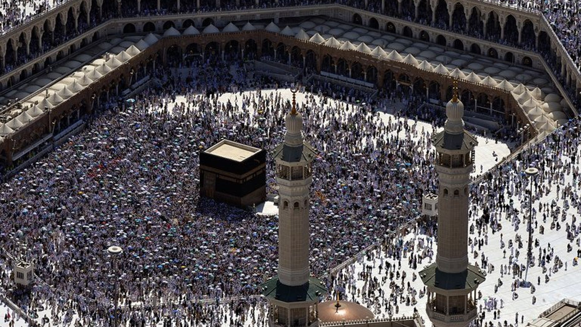 An aerial view shows the Kaaba at the Grand mosque in the holy city of Mecca, on October 27, 2012. Fears of an outbreak of the deadly MERS virus in Saudi Arabia and construction in the holy city of Mecca have forced cuts in the numbers of pilgrims permitted to perform this year's hajj.