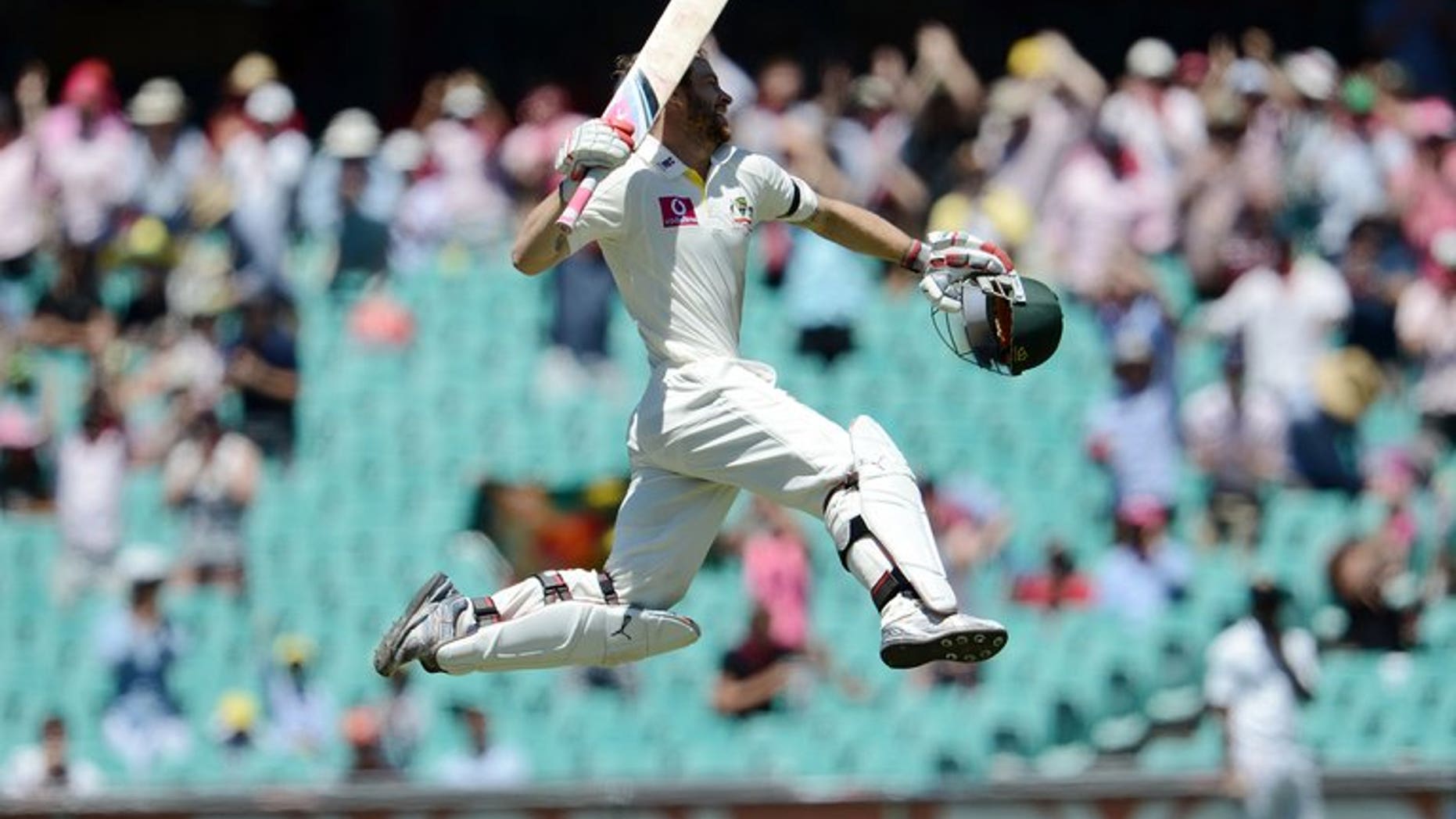 Australian batsman Matthew Wade celebrates after scoring a century at the Sydney Cricket Ground on January 5, 2013. Wade has no problems about giving up his wicketkeeping role if he can earn a place in Australia's Ashes side as a specialist batsman.