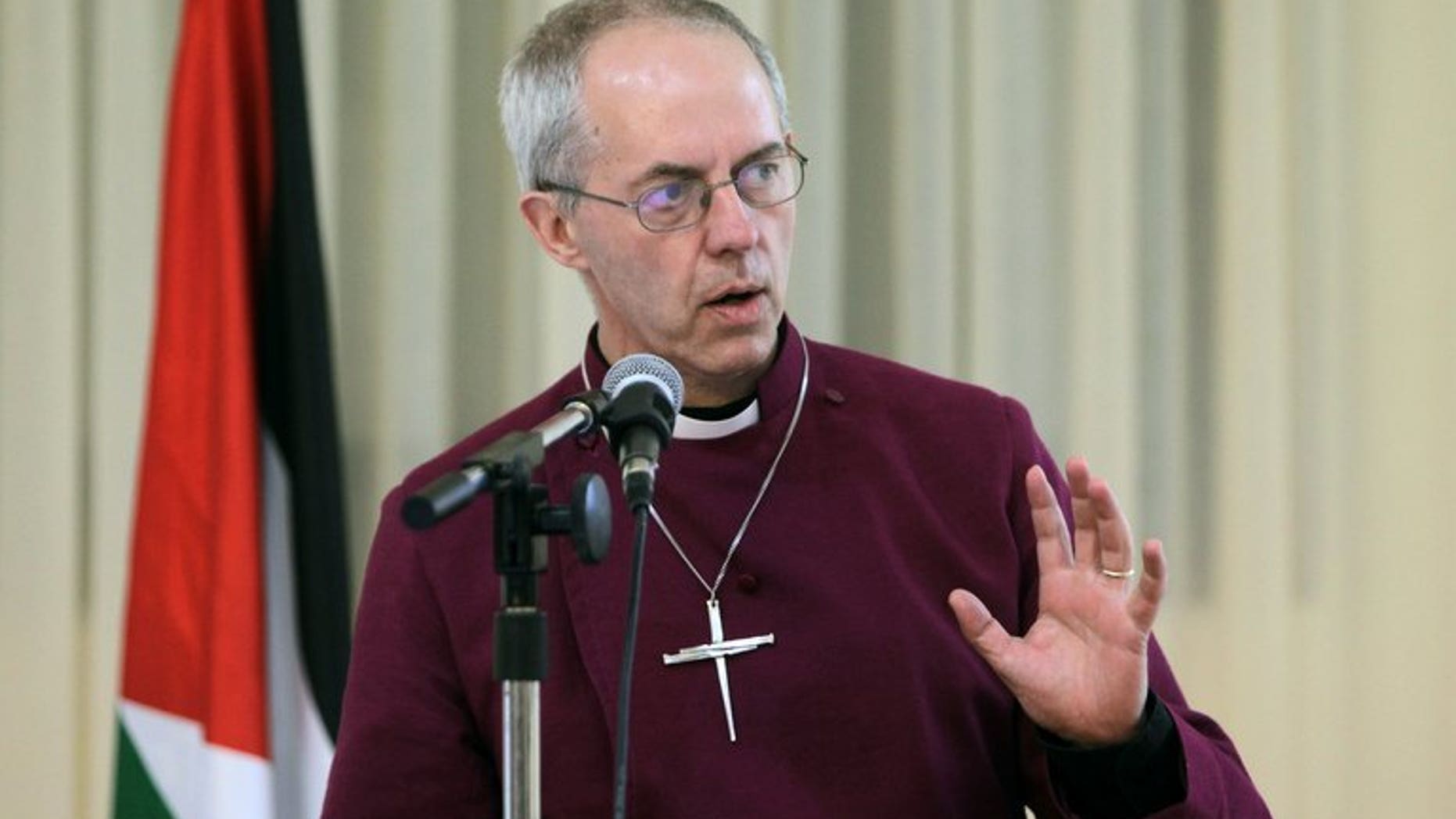 Archbishop of Canterbury Justin Welby speaks at the Saint Andrews Episcopal Church in the West Bank city of Ramallah on June 27, 2013. Welby was said to be "furious" Thursday after finding out its pension fund invested in a high-interest loans company he had earlier promised to destroy.