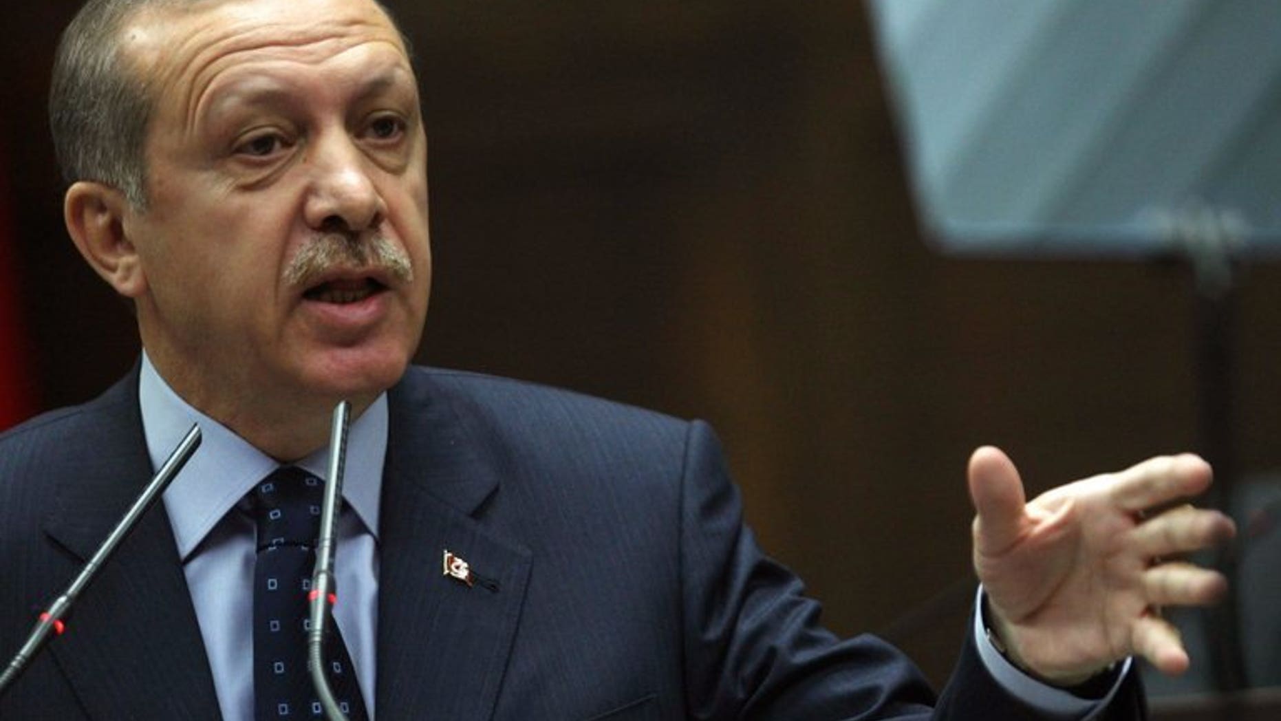 Turkey's Prime Minister Recep Tayyip Erdogan holds a meeting at the Turkish parliament in Ankara on May 14, 2013. Erdogan warned against any plans for an autonomous Kurdish region in northern Syria as officials met the leader of the war-torn country's main Kurdish group Friday.