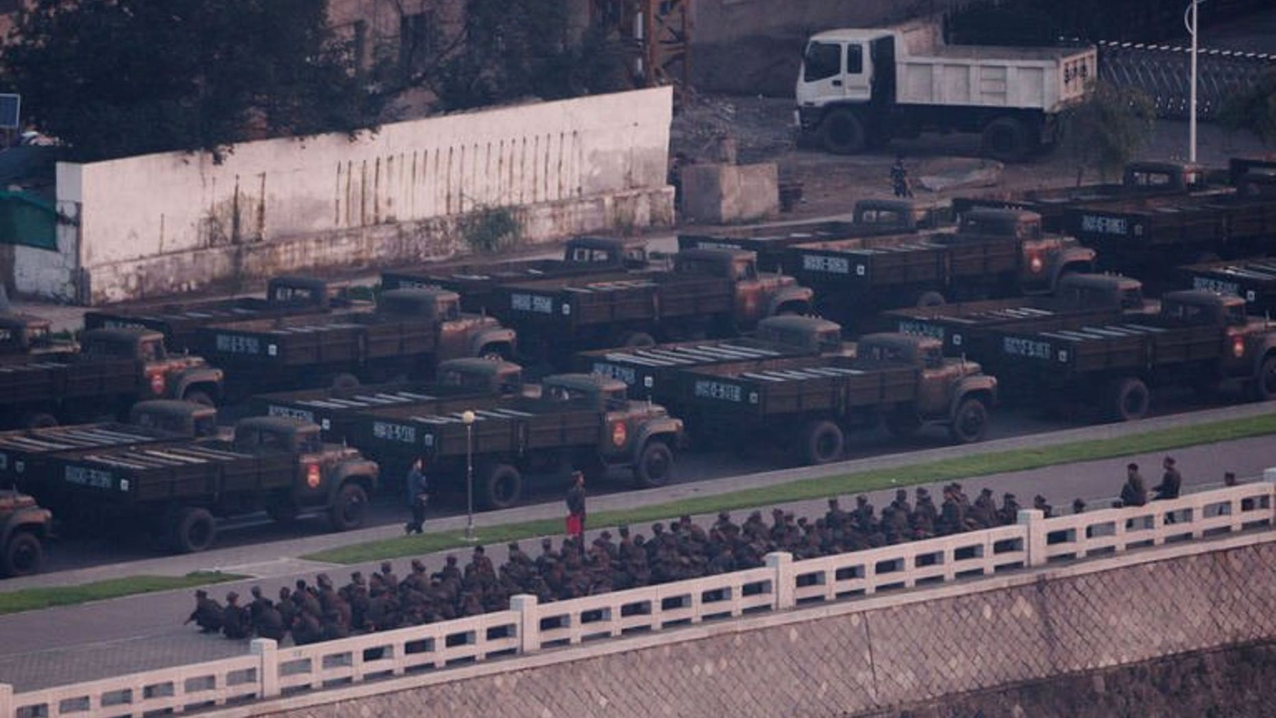 North Korean army vehicles line up during preparations for a militay parade in Pyongyang, early morning on July 27, 2013. N.Korea is staging a major military parade to mark the 60th anniversary of the Korean War ceasefire.