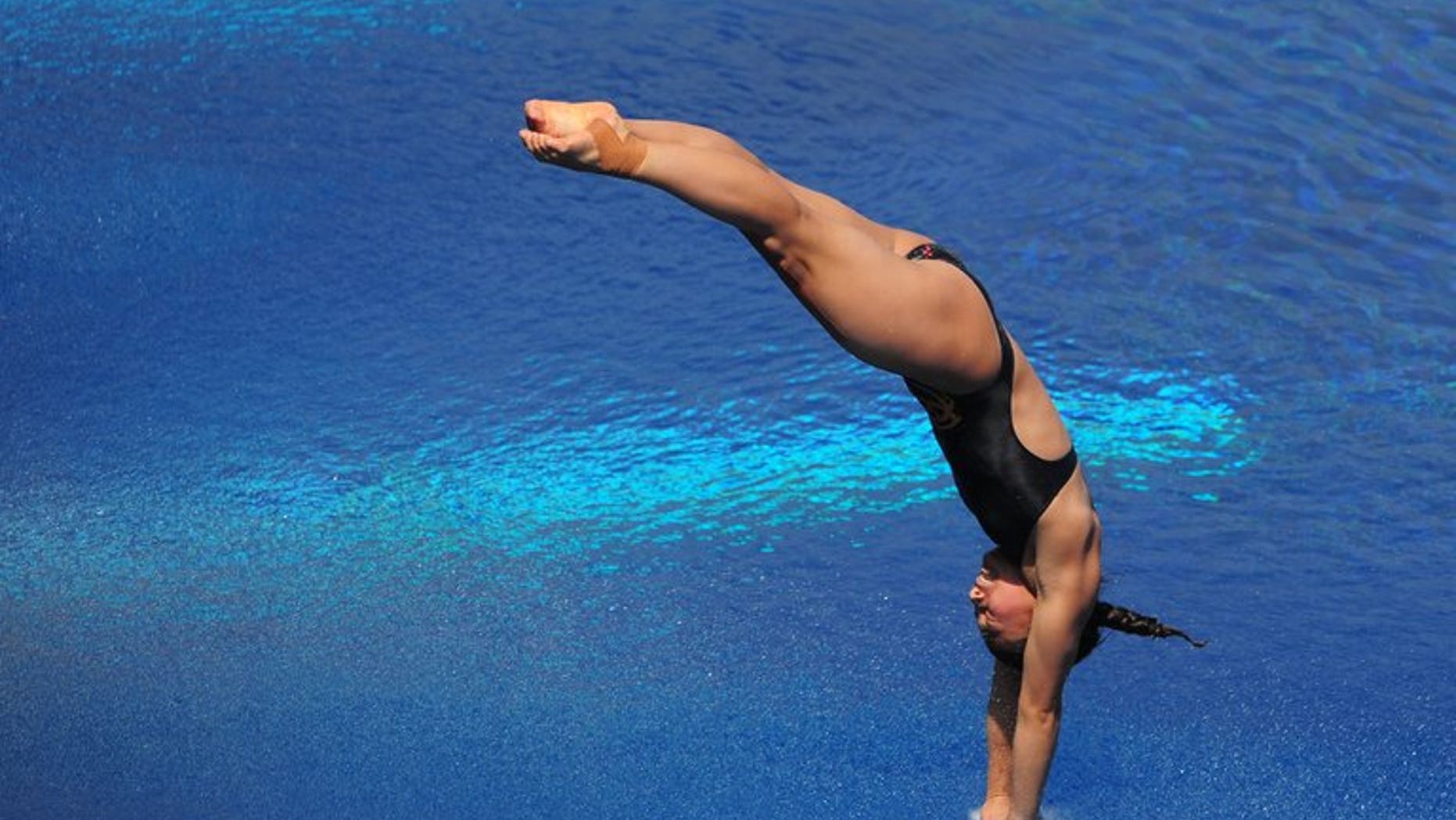 China's He Zi won the women's world 3m springboard title with compatriot Wang Han claiming silver and Pamela Ware of Canada finishing with bronze.