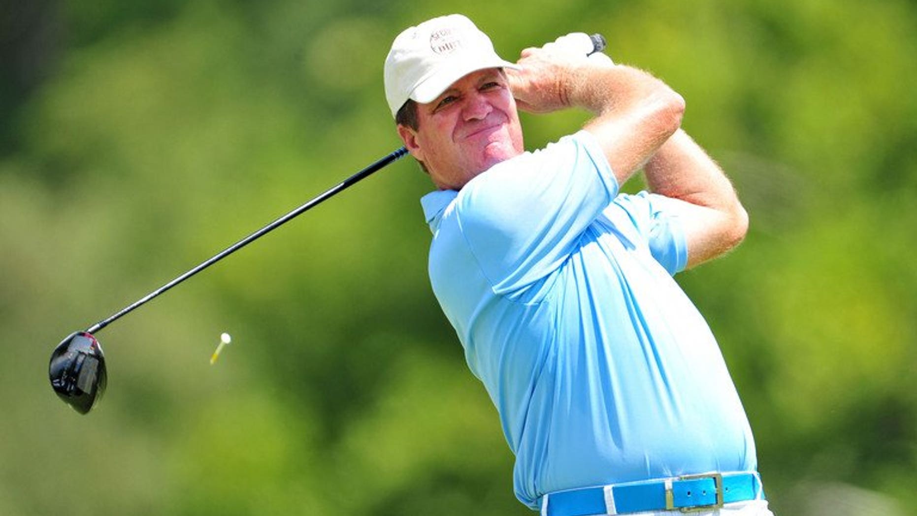 Steve Elkington of Australia watches his tee shot on August 11, 2011. He became the latest Australian sports figure to be at the centre of a racism row when the golfer insisted he'd no idea 'Pakki' was an abusive term as he apologised for offensive Twitter messages.