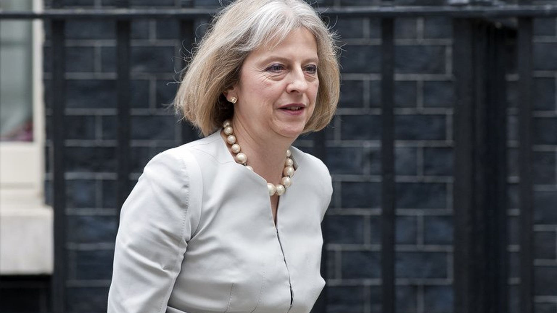 Home Secretary Theresa May leaves 10 Downing Street on June 26, 2013, after attending a cabinet meeting. May has been diagnosed with type 1 diabetes, a serious form of the condition that means she will need daily insulin injections for the rest of her life.
