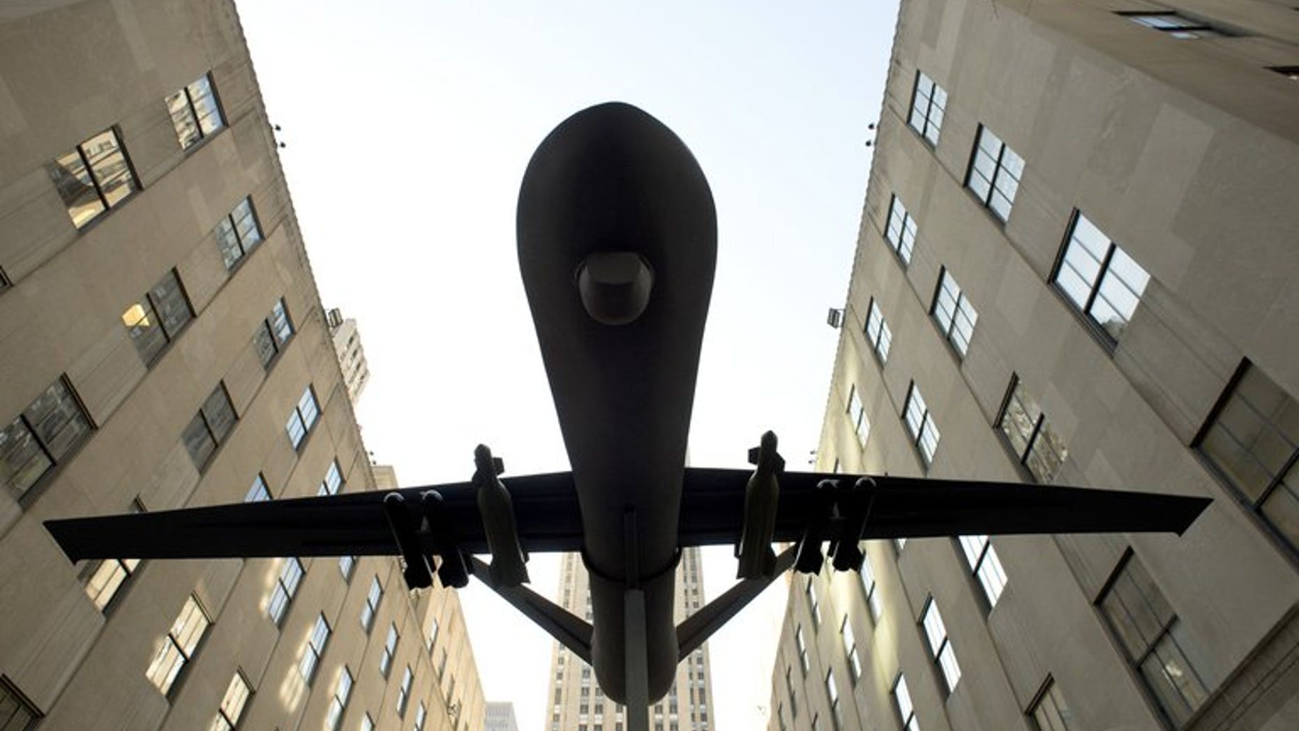 Demonstrators hoist a model of a US drone on April 3, 2013 in New York. An apparent US drone strike killed six suspected Al-Qaeda militants overnight, a Yemeni military source told AFP.