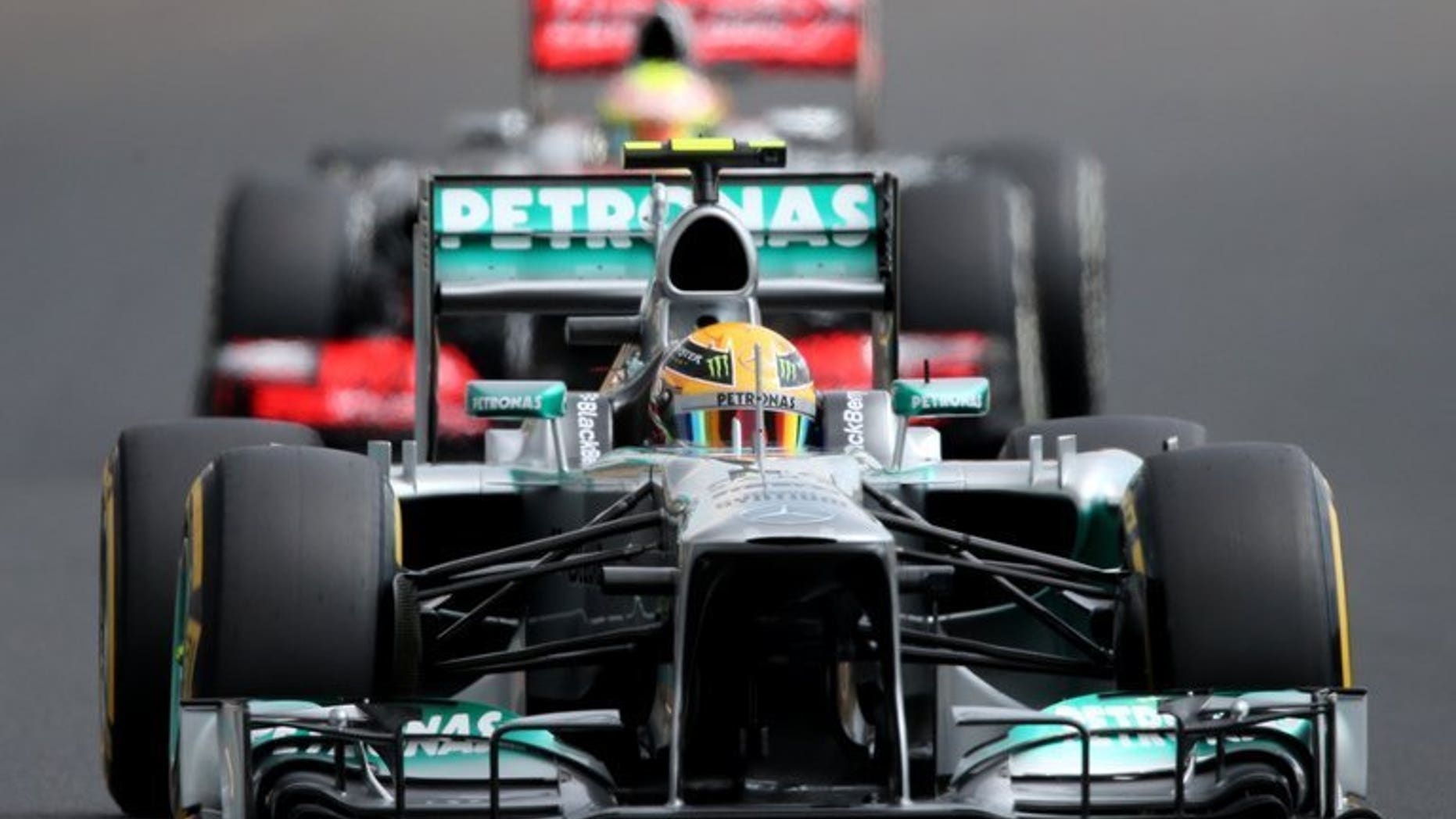 Mercedes' British driver Lewis Hamilton drives during the qualifying session at the Hungaroring circuit in Budapest on July 27, 2013. Hamilton of Mercedes won the Hungarian Grand Prix from pole on Sunday, with Lotus' Kimi Raikkonen second and defending champion Sebastian Vettel of Red Bull third.