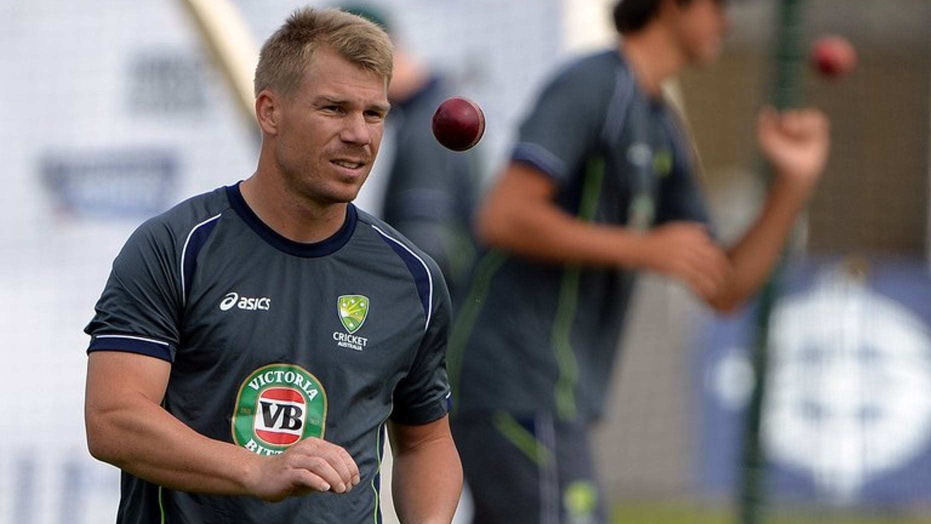 Australia's David Warner attends a practice session at Trent Bridge in Nottingham on July 8, 2013. David Warner is to rejoin Australia's squad in England, a team spokesman told AFP, as the controversial batsman eyes a recall for a third Test that the tourists must win to keep their Ashes hopes alive.