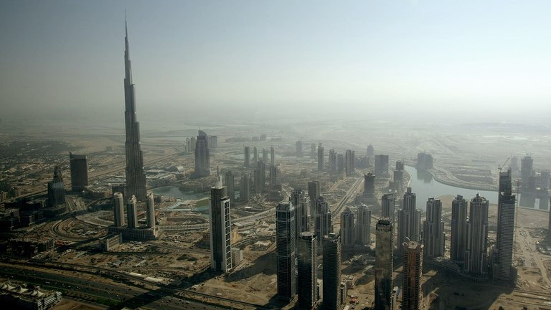 An aerial view shows the Burj Khalifa rising among skyscrapers in Dubai on December 17, 2009. Dubai-based real estate giant Emaar Properties said Monday its net profit increased 10 percent to $184 million in the second quarter of 2013, as sales nearly quadrupled.