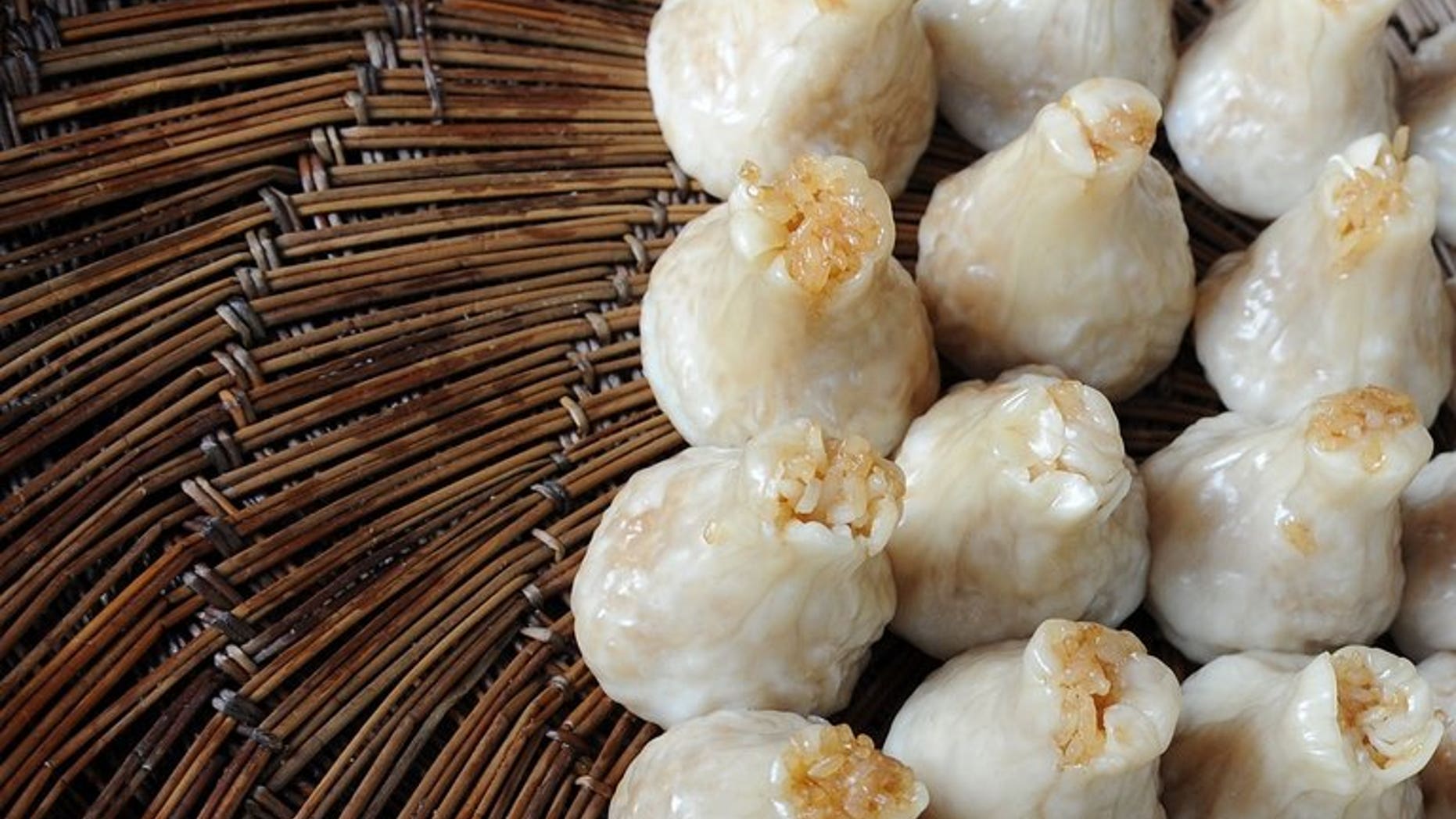 A man has gone on trial for poisoning frozen dumplings that were exported to Japan and made 10 people ill, in a case that raised tensions between Beijing and Tokyo.