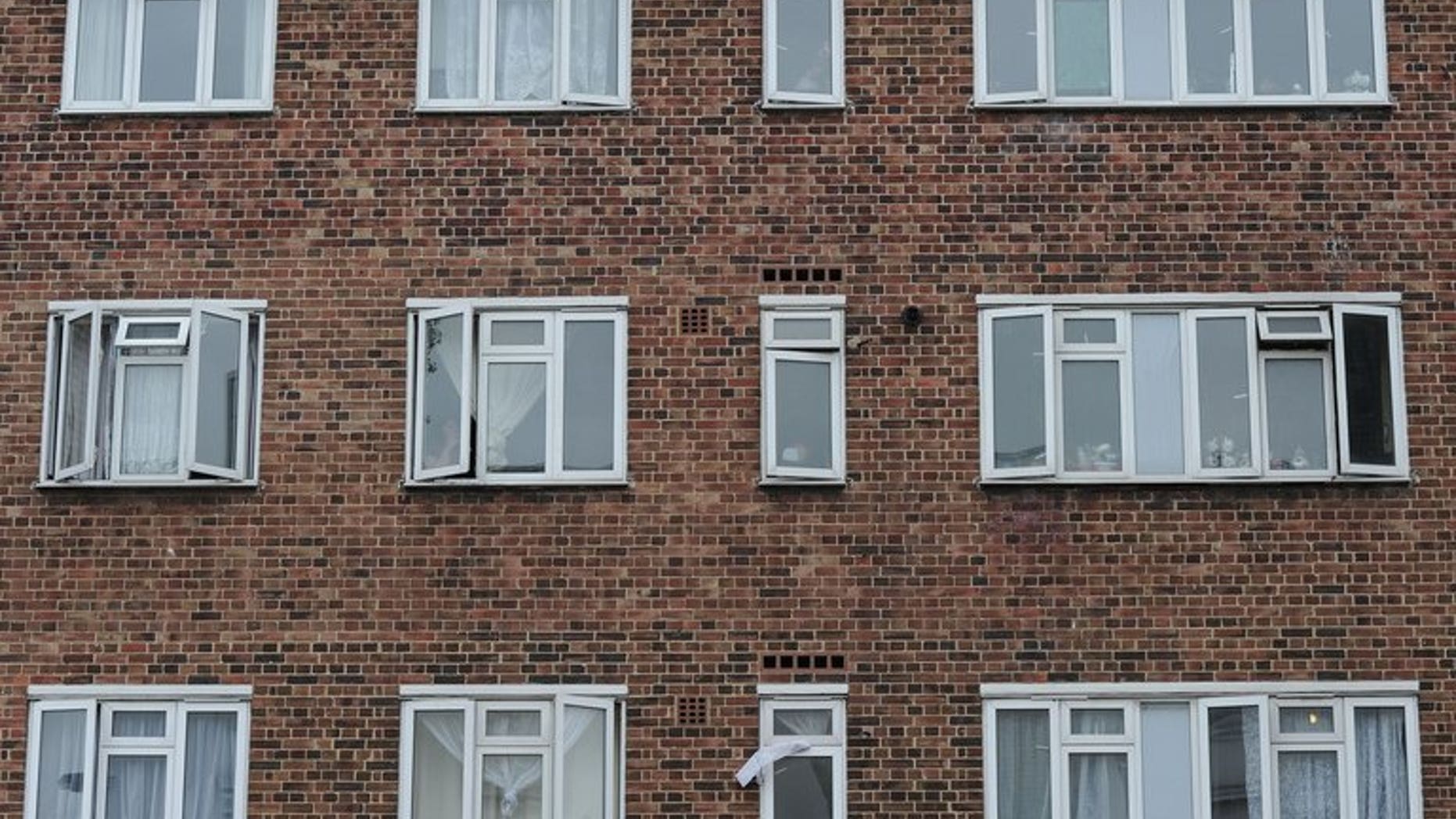 A block of flats is pictured in west London, on August 30, 2011. Cuts to social housing benefit dubbed the "bedroom tax" do not discriminate against disabled people, a High Court ruled Tuesday, dismissing a legal challenge by campaigners.