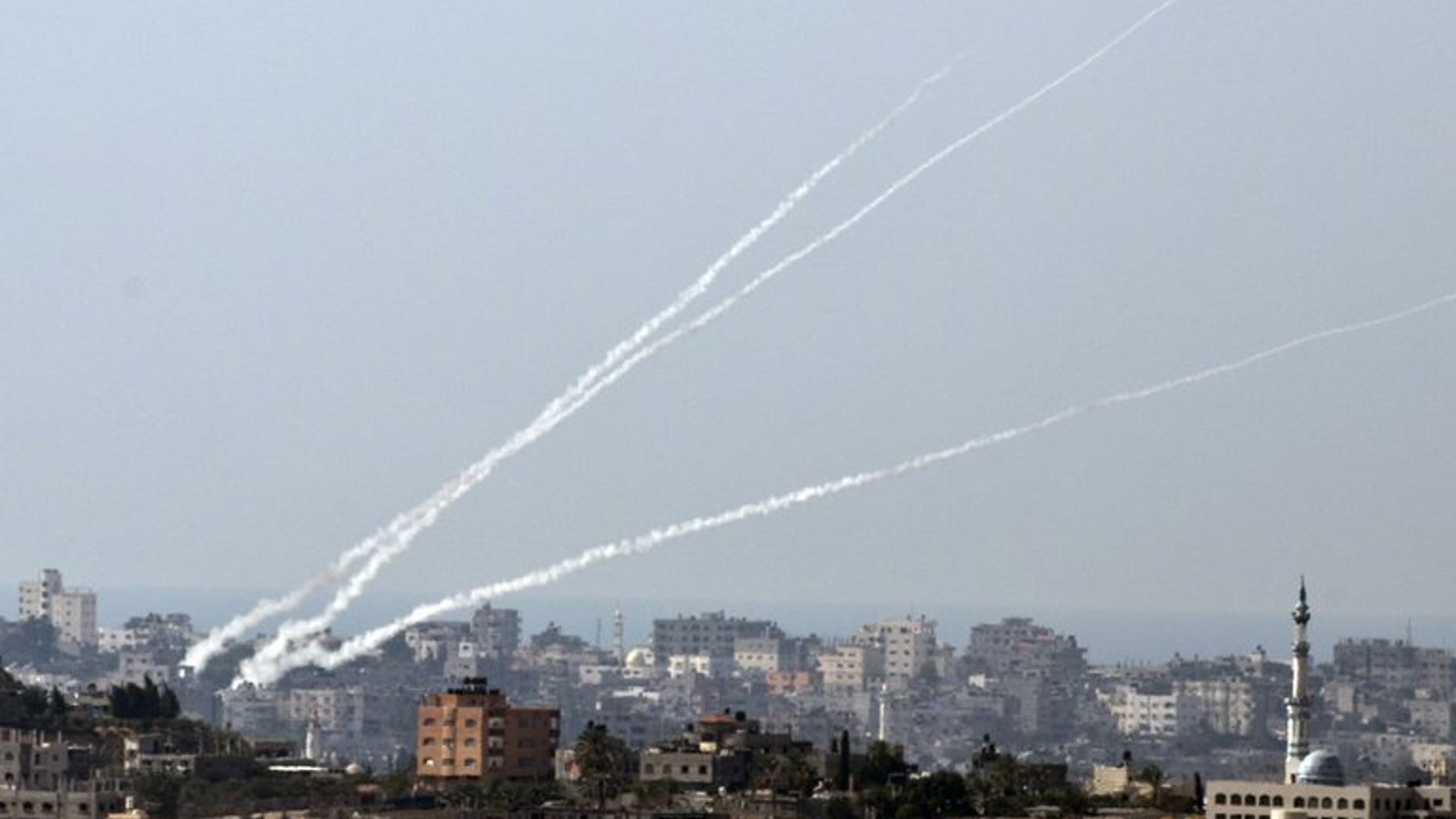 File picture shows a trail of smoke from rockets launched from the Palestinian Gaza Strip towards southern Israel on October 24, 2012. A rocket fired from Gaza hit southern Israel Tuesday, causing no casualties, a police spokesman said, as a first full day of resumed Middle East peace talks was to open.