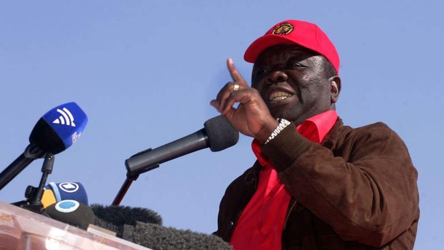 Zimbabwe's Prime minister and leader of the Movement for Democratic Change (MDC), Morgan Tsvangirai, addresses his final campaign rally in Harare on July 29, 2013. Casting his ballot Wednesday, Tsvangirai expressed confidence he will win an historic and overwhelming victory against his veteran rival President Robert Mugabe.