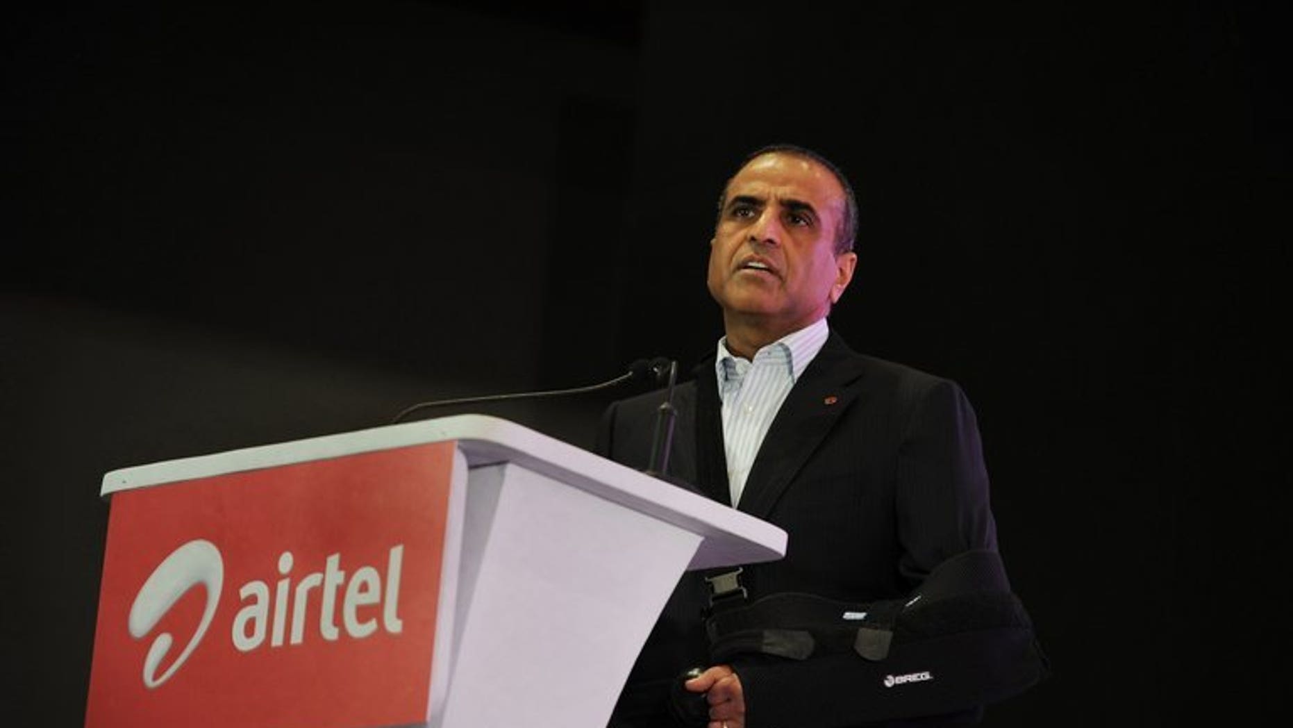 Bharti Airtel chairman Sunil Mittal gives a speech in Kolkata lastyear. India's top mobile firm has reported its 14th straight quarterly profit fall, hit by foreign exchange losses, but its shares soared on hopes of better performance as tariff wars waned.