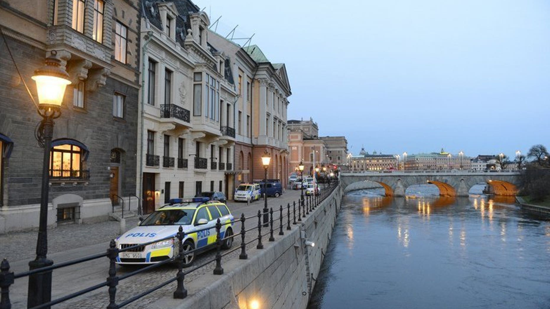 A Swedish police car is parked outside the Sagerska Palace in Stockholm, on November 9, 2012. A Swedish man long considered Scandinavia's worst serial killer has been cleared of eight murders he once confessed to, after prosecutors dropped their final charge against him.