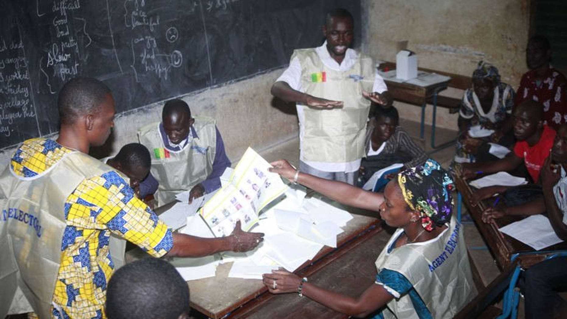Electoral agents count the votes at a polling station on July 28, 2013 in the Malian capital Bamako. The party of Malian presidential candidate Soumaila Cisse said Wednesday the election had been marred by "ballot stuffing" and demanded the resignation of the minister responsible for the polls.