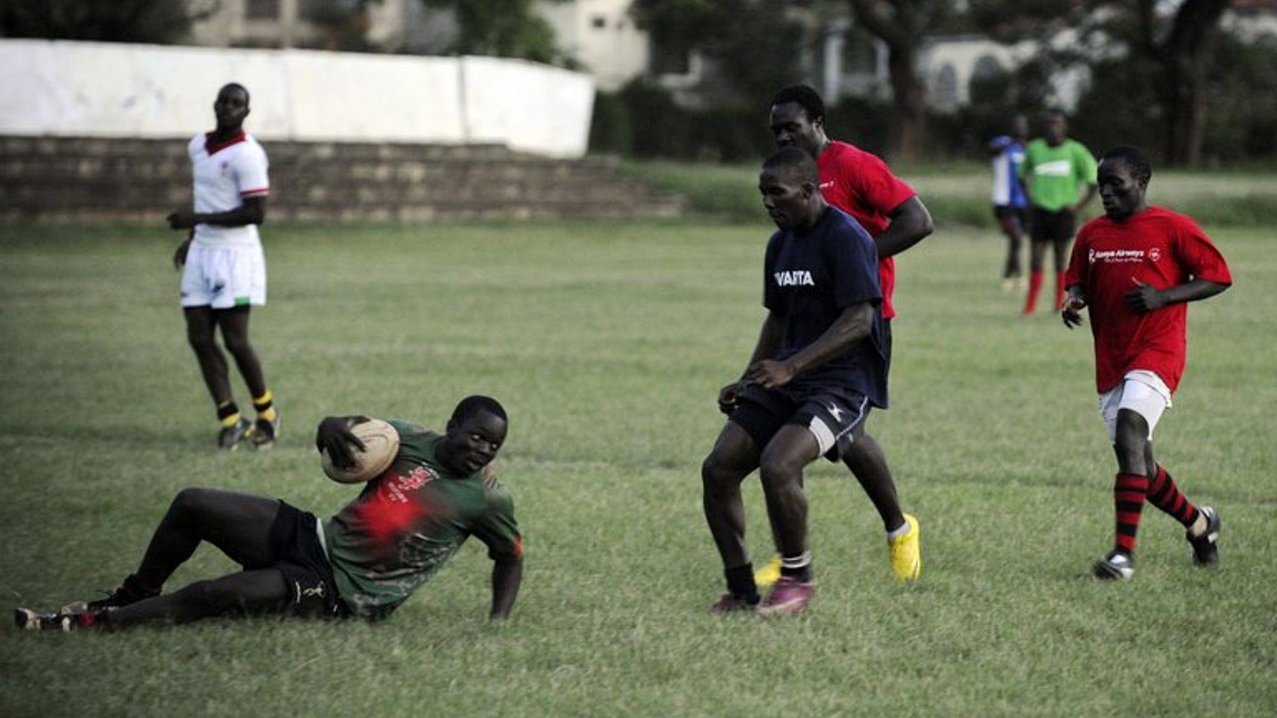 Rugby sevens Kenyan national team players take part in a training session on November 2, 2012 in Nairobi. Mike Friday resigned as Kenya Sevens head coach on Wednesday, citing too much interference in his work and disatisfaction over the lack of funding for the national team.