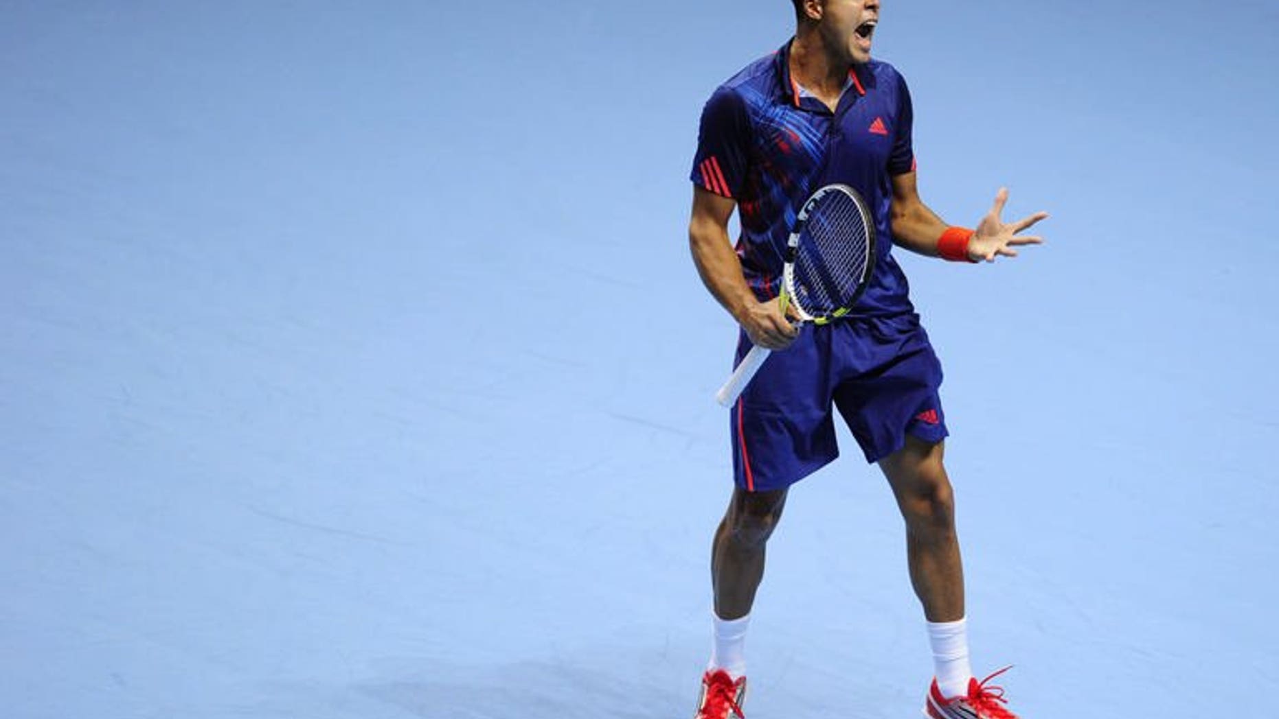 France's Jo-Wilfried Tsonga reacts after a point in London on November 7, 2012. Tsonga of France has withdrawn from next week's ATP Rogers Cup, organizers said Wednesday, due to a left knee injury that forced him out at Wimbledon.
