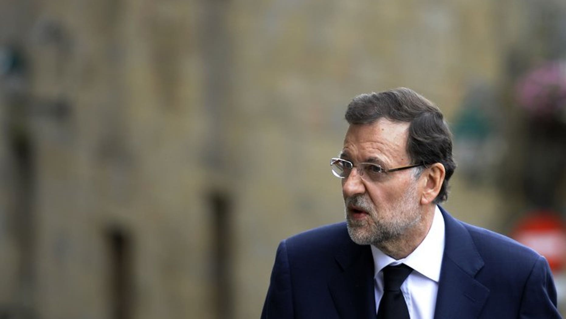 Lawmakers on Thursday will grill Spain's Prime Minister Mariano Rajoy, pictured July 29,2013, over a corruption scandal that has sparked calls for him to quit.