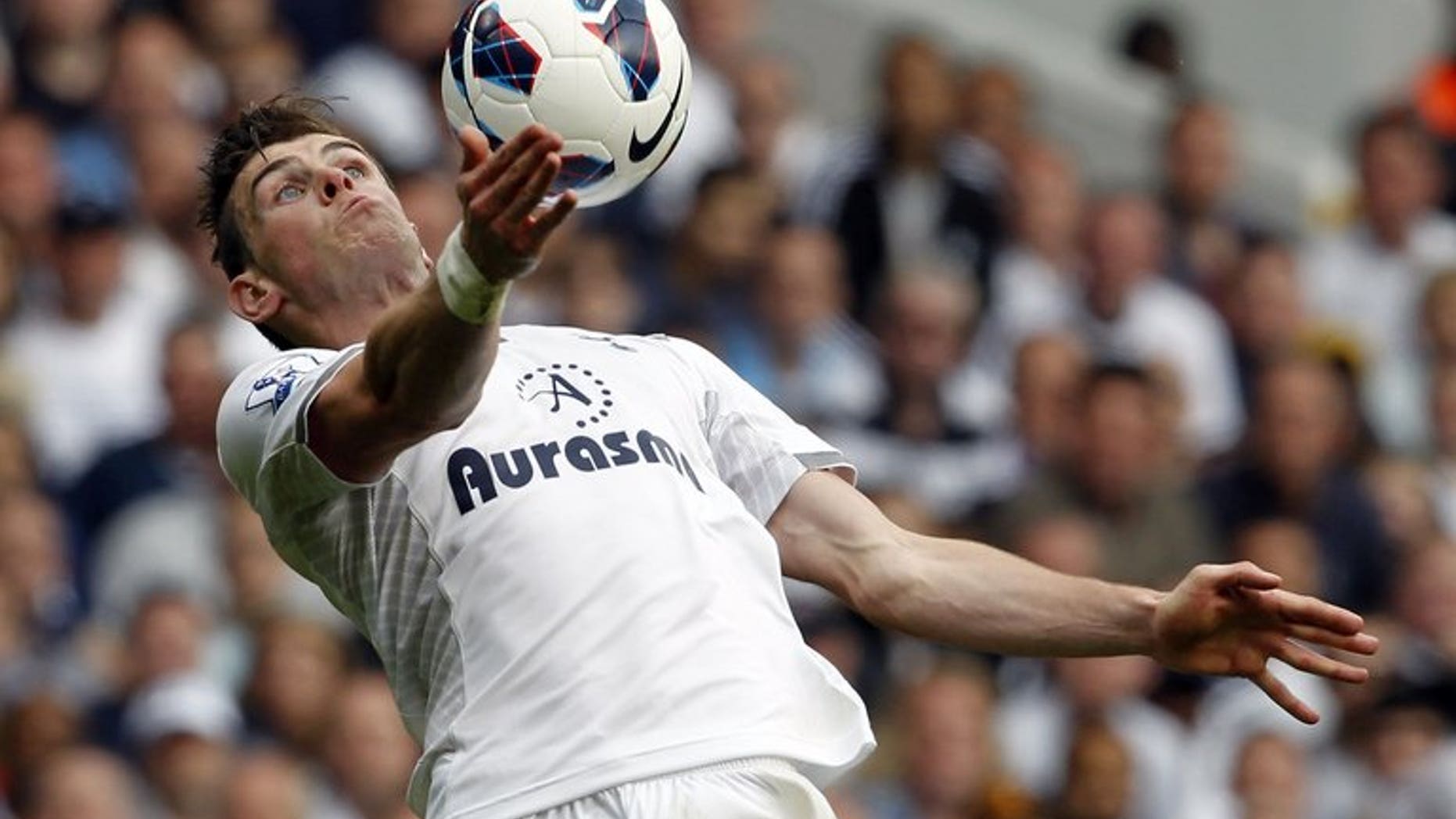 Tottenham Hotspur midfielder Gareth Bale controls the ball during a Premier League match against Sunderland at White Hart Lane in London on May 19, 2013. Real Madrid are in talks to try to sign Bale, coach Carlo Ancelotti has revealed, amid speculation that the Spaniards could be prepared to break the world transfer record for the highly rated winger.