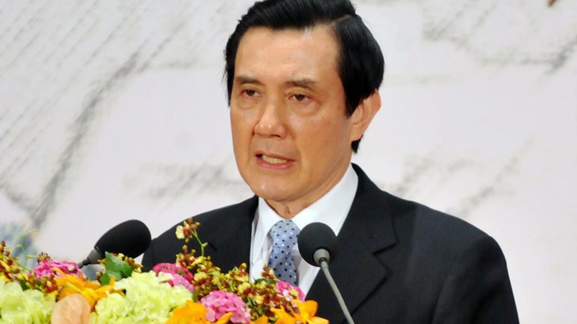Taiwan's President Ma Ying-jeou speaks at the headquarters of the island's quasi-official Straits Exchange Foundation in Taipei on April 29, 2013. Ma defended a controversial trade pact with China following protests against the deal, saying it would benefit the island's economy.