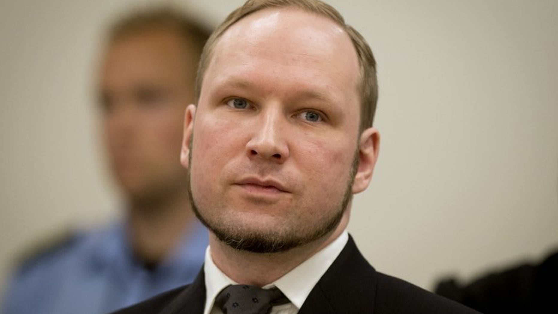 Norwegian mass murderer Anders Behring Breivik arrives in court for his sentencing in Oslo, on August 24, 2012. The Norwegian prison where Breivik is being held has agreed in principle to allow the convicted mass murderer to study political science, if the university wants him.