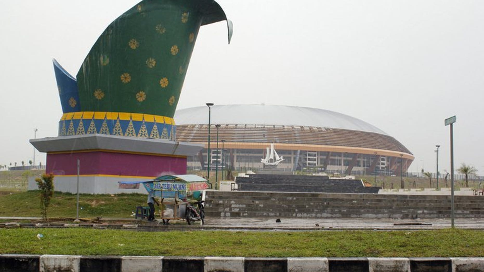 A general view of the under construction main sports stadium to be used for the Islamic Solidarity Games in Pekanbaru located in Indonesia's Sumatra island on April 2, 2013. Indonesia has moved the venue for the Islamic Solidarity Games for a second time, an official said, this time to a city that co-hosted the ill-fated 2011 Southeast Asian Games .