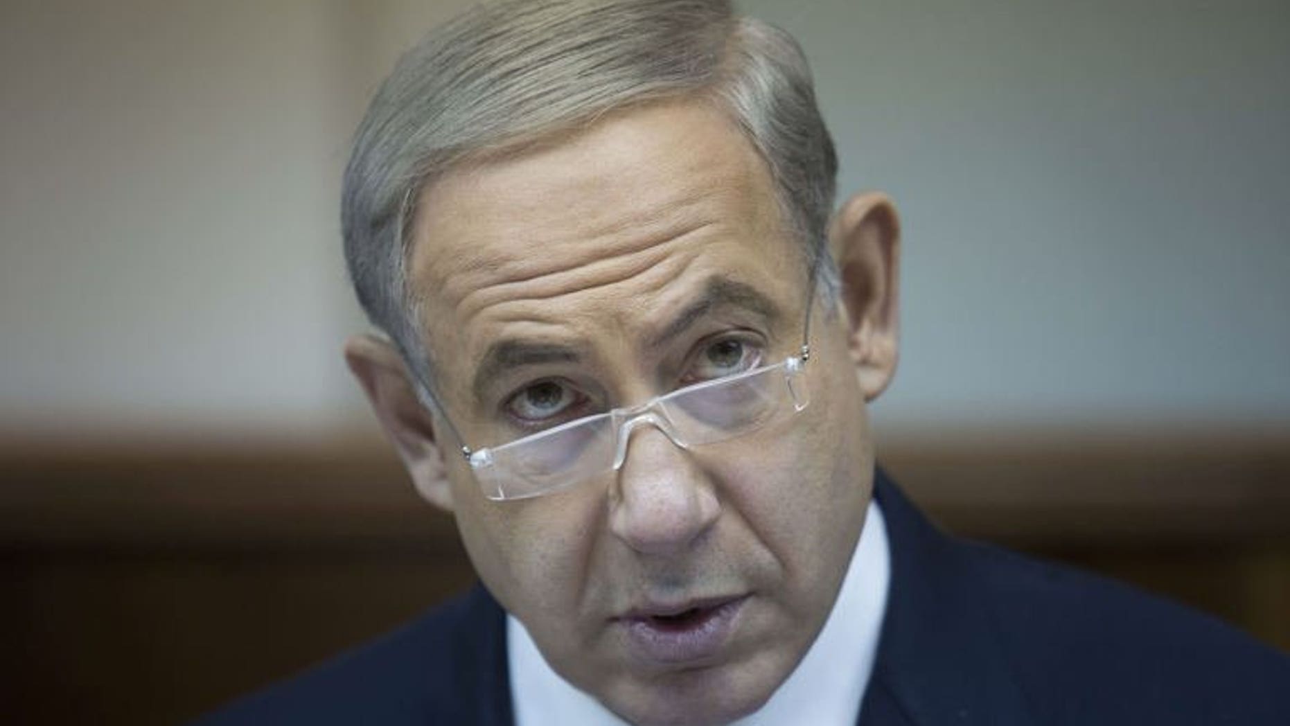 Israeli Prime Minister Benjamin Netanyahu attends the weekly cabinet meeting in his Jerusalem office, on July 14, 2013. Netanyahu has hailed new US sanctions over Iran's nuclear programme, approved ahead of the new Iranian president's inauguration.