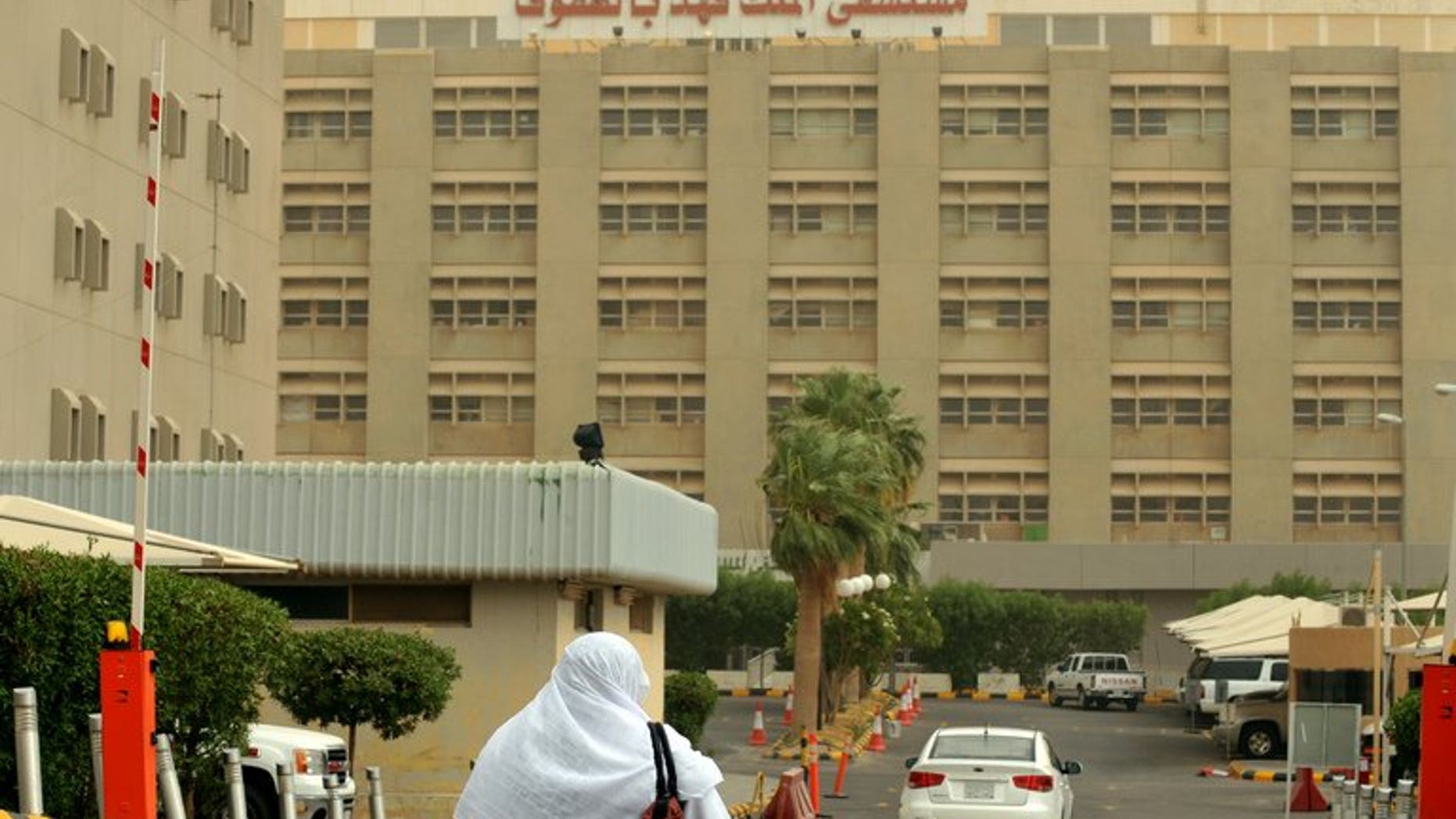 A Saudi nurse walks towards the King Fahad hospital in the city of Hofuf on June 16, 2013. Three women have contracted the deadly MERS virus in Saudi Arabia, which has been hardest hit by the enigmatic disease, the World Health Organisation said Thursday.