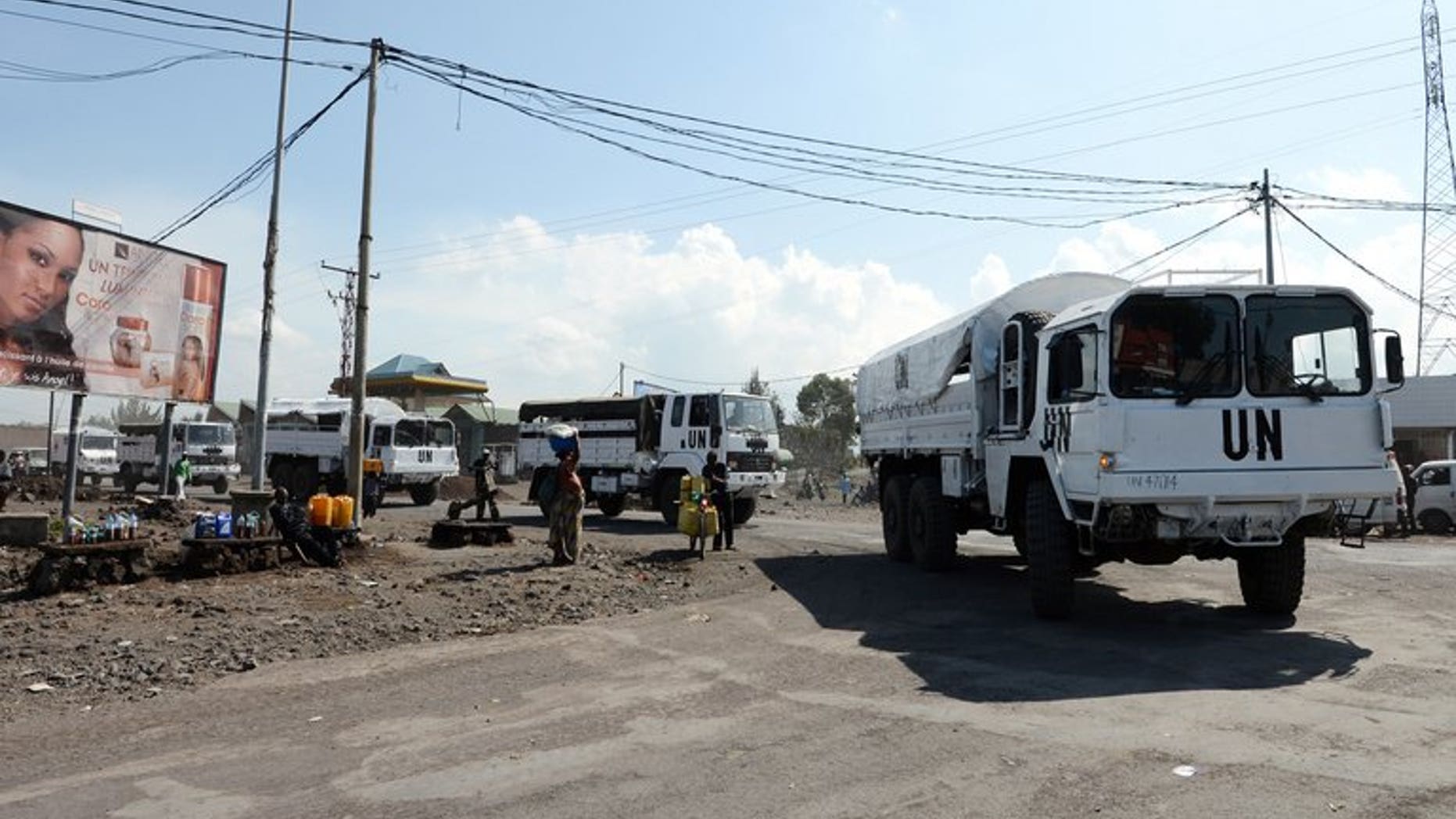 UN peacekeepers from Tanzania drive a convoy through the streets of Goma on May 29, 2013. Police have fired tear gas to disperse protesters who hurled stones at a UN peacekeepers' convoy in the volatile east of the Democratic Republic of Congo, one of several small demonstrations demanding an extension of the security zone.