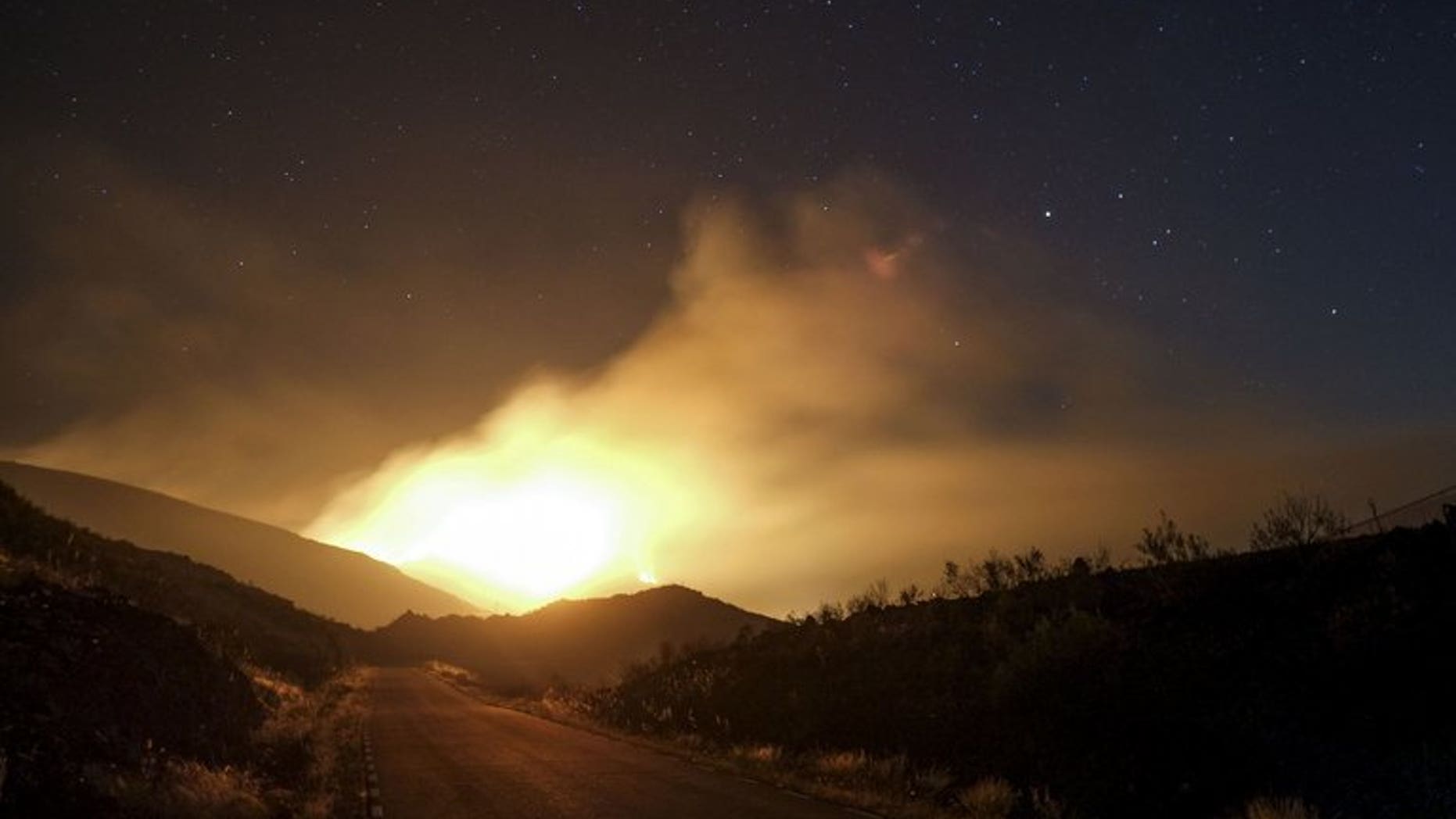 Smoke billows from a wildfire in Tortuero, near the central Spanish city Guadalajara on August 1, 2013. Firefighters brought under control a major forest blaze in central Spain on Friday but the country remained on high alert for fires in the sweltering summer heat, authorities said.