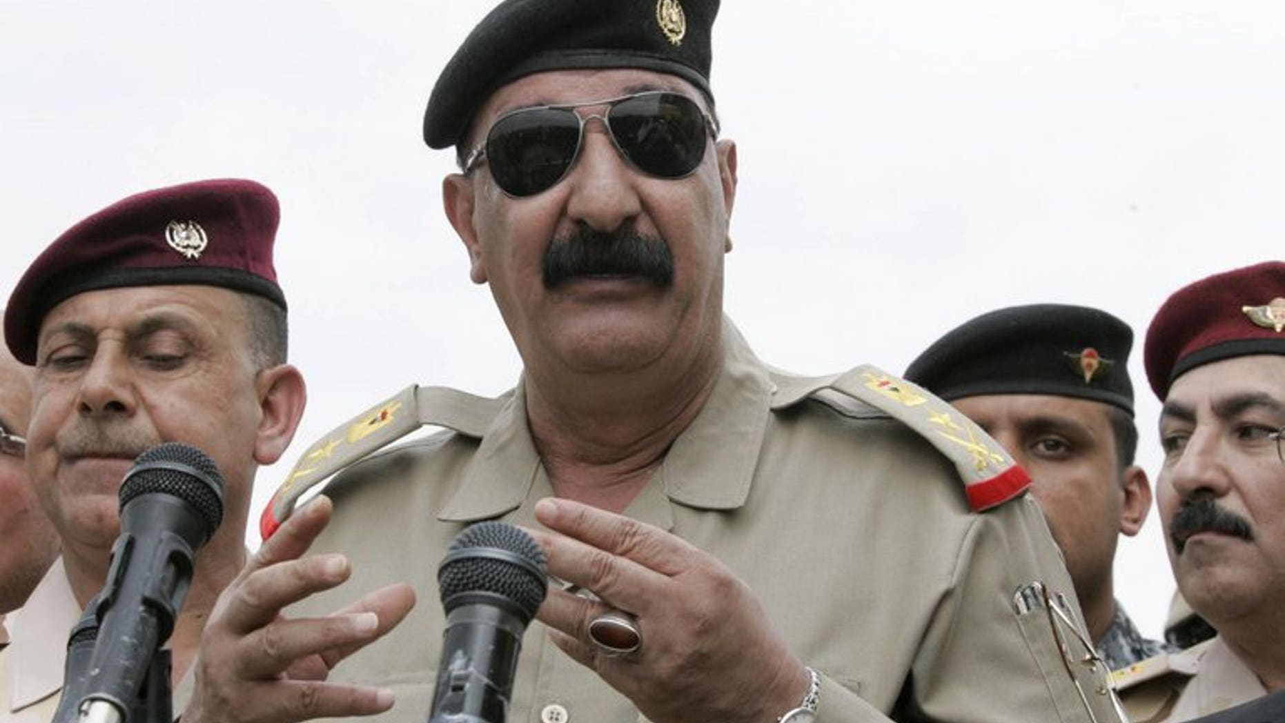 Iraqi Staff Lieutenant General Abdulamir al-Zaidi addresses troops in Kirkuk on October 21, 2012. Zaidi said he survived a bombing on Saturday that killed nine soldiers during an operation against Al-Qaeda militants in Diyala province north of Baghdad.