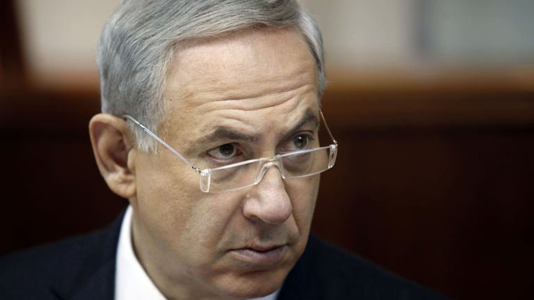 Israeli Prime Minister Benjamin Netanyahu opens the weekly cabinet meeting in Jerusalem, on August 4, 2013. Netanyahu has lashed out at new Iranian President Hassan Rowhani, saying that he shared his hardline predecessor's aim of destroying the Jewish state.