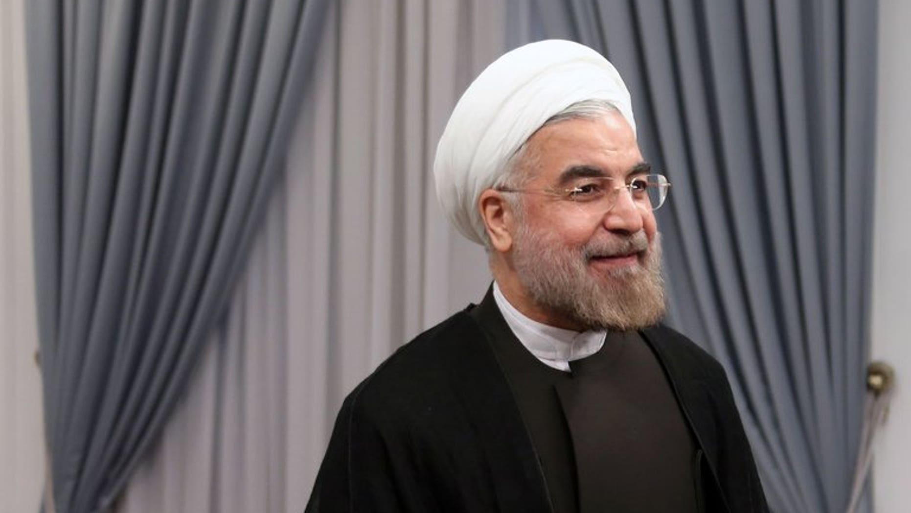 Iran's new President Hassan Rowhani is seen on his first official day in office in Tehran on August 3, 2013. Rowhani took the oath before parliament on Sunday, at a ceremony attended for the first time by foreign dignitaries including regional leaders.