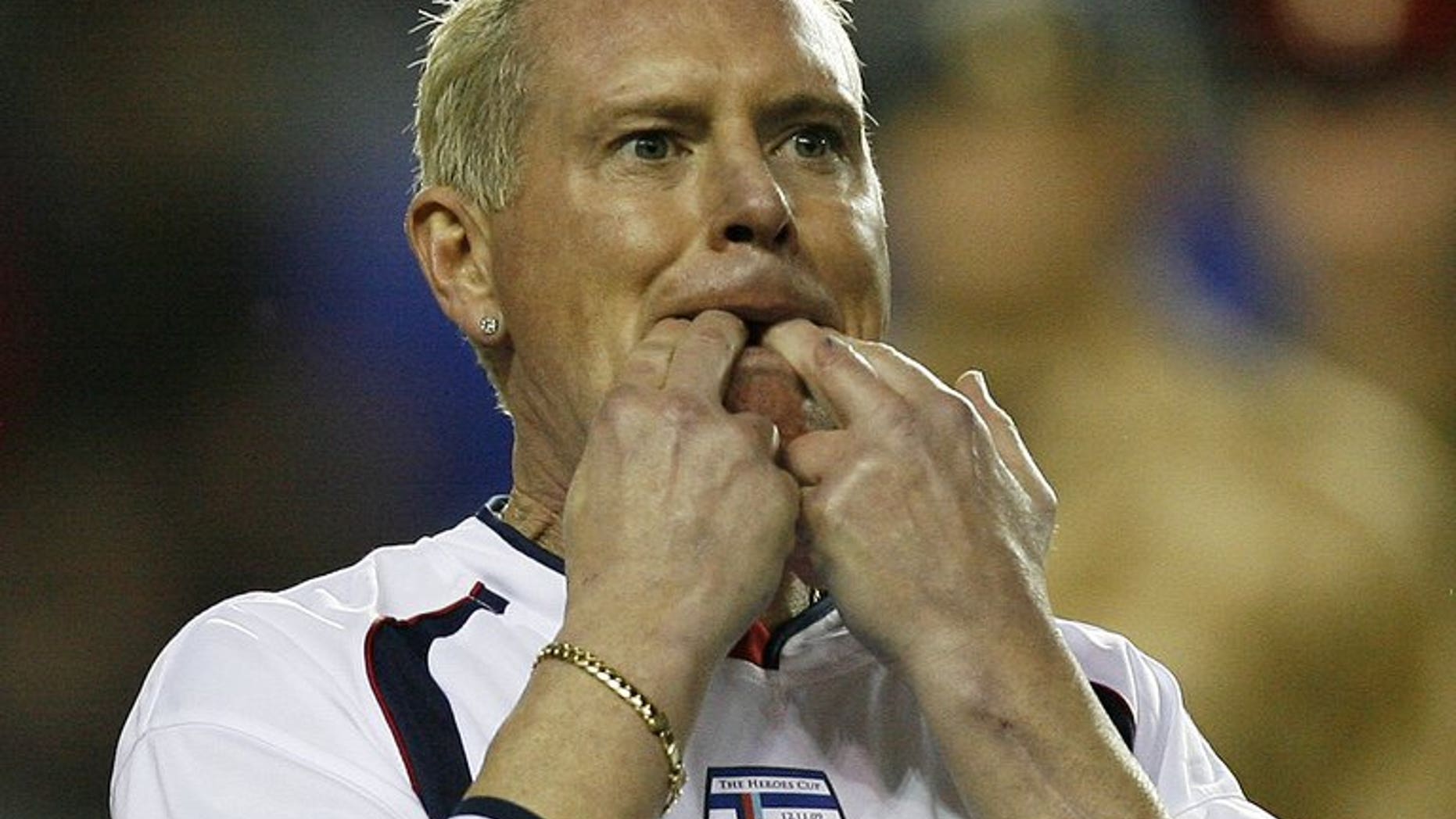 This file photo shows former midfielder Paul Gascoigne during a charity match in Reading, on November 12, 2009. Troubled ex-England star will appear at a court in Stevenage on Monday to face two charges of common assault, following an incident at a railway station.