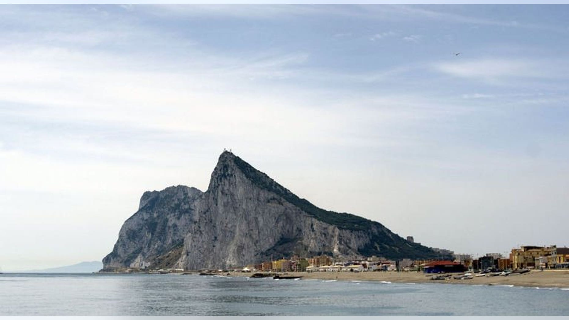The Rock of Gibraltar is pictured from Linea de la Concepcion, near Cadiz. Britain has vowed to carry out its "constitutional commitments" to the people of Gibraltar after the territory accused Spain of deliberately causing delays at the border crossing last weekend.