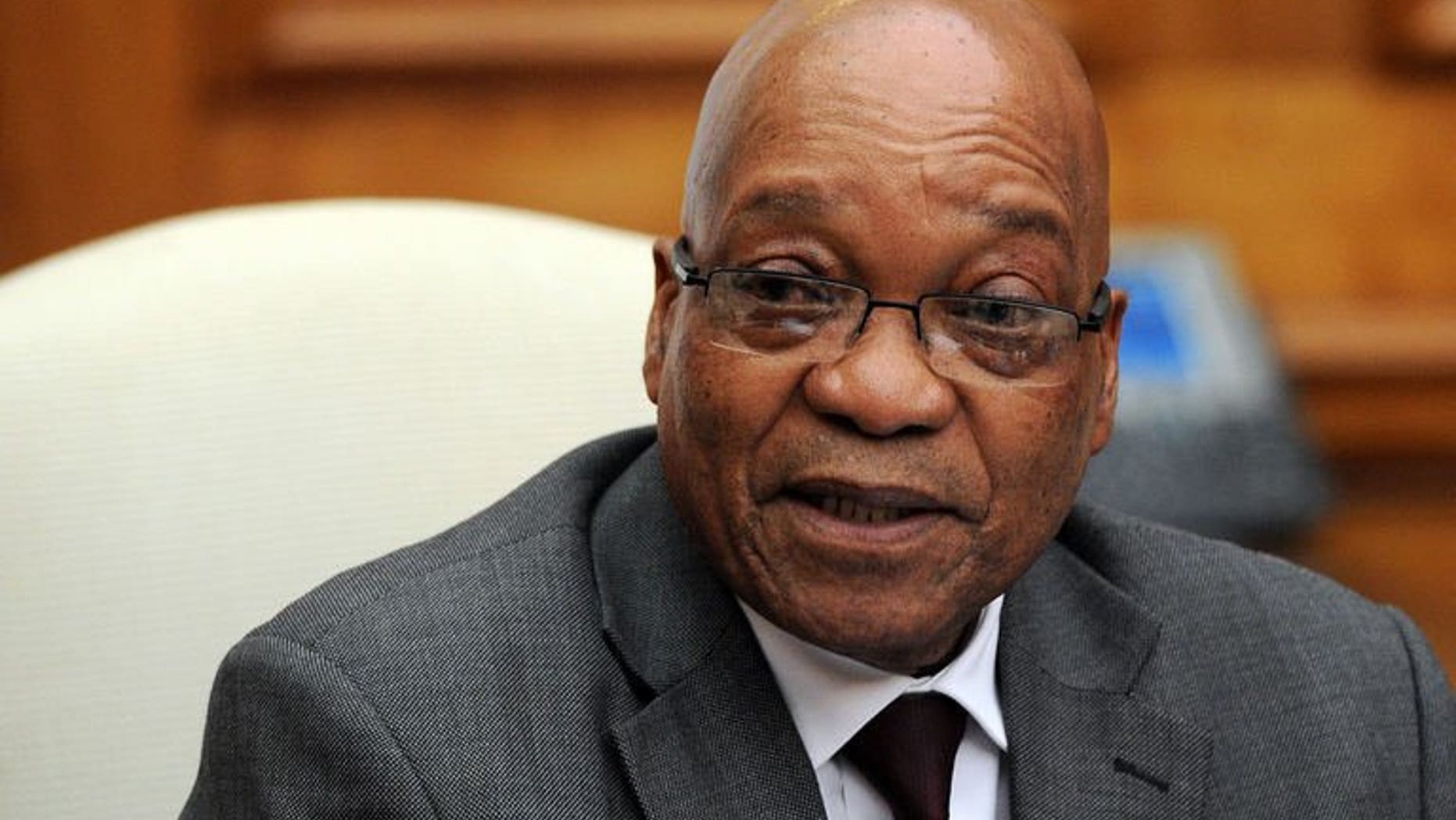 South Africa President Jacob Zuma is pictured in Pretoria on July 29, 2013. A South African public inquiry into a suspect multi-billion dollar government arms deal has been adjourned shortly before Zuma was expected to testify.