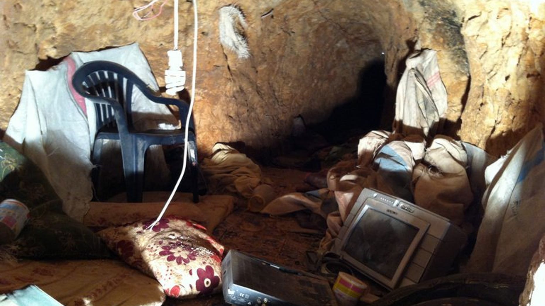 A picture taken on June 7, 2013, shows a tunnel allegedly used by rebels in Dabaa, north of Qusayr, in Syria's central Homs province. Rebel 'moles' are digging underground to create tunnels through which they transport weapons, move fighters and prepare explosives away from the fighter jets and helicopters of the army, which buzz overhead.