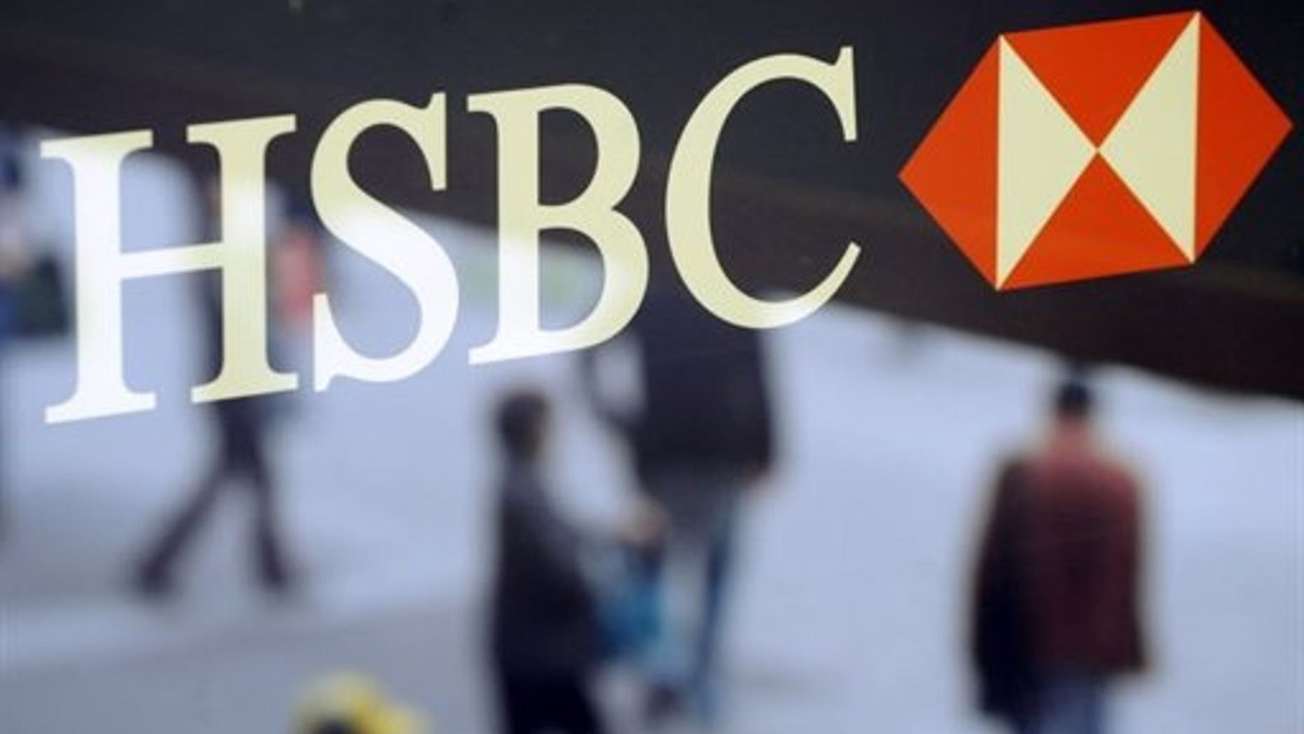 Shares in global banking giant HSBC fell almost five percent Tuesday after its interim results fell short of analysts' expectations.