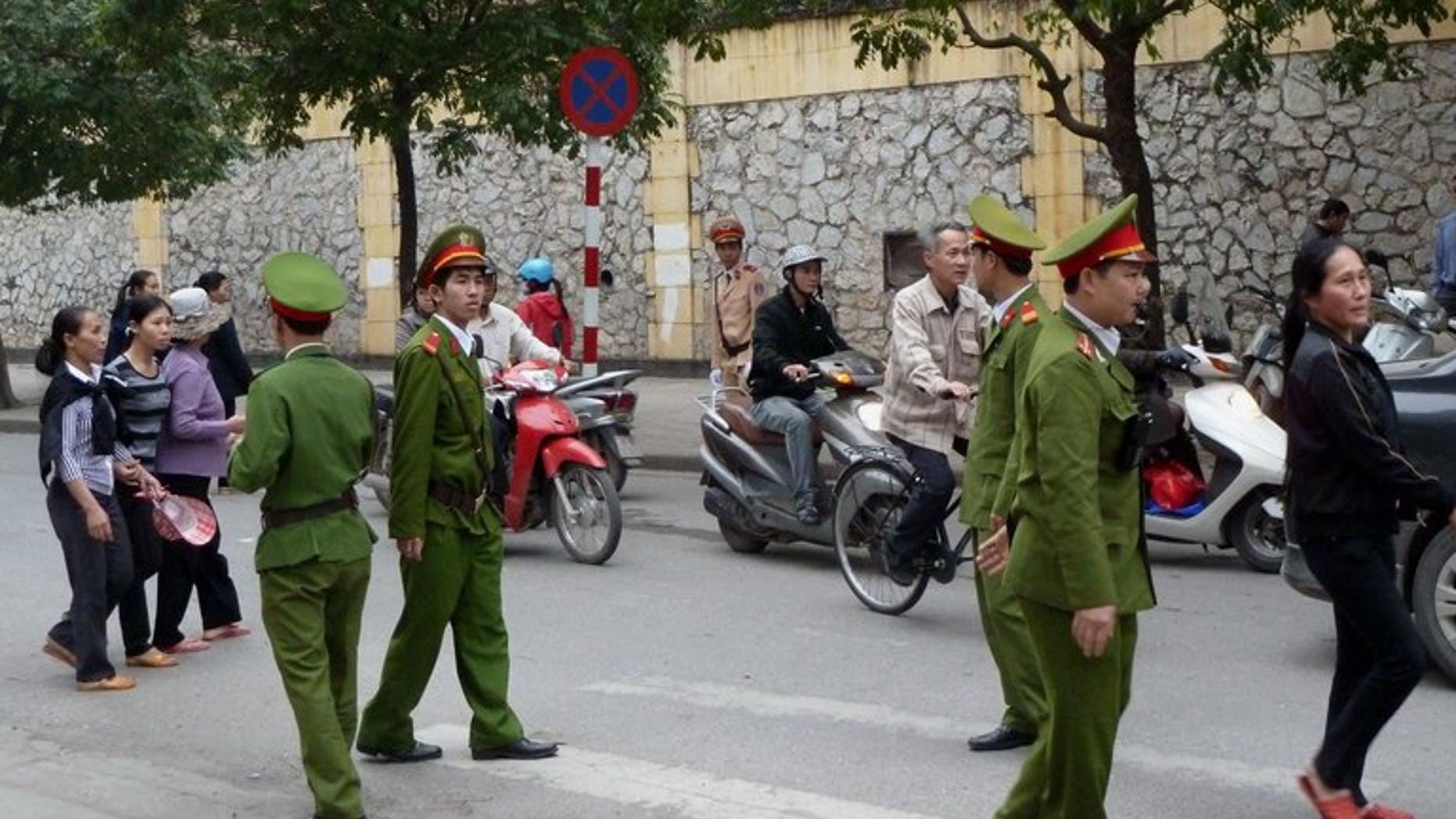 Policemen patrol on a street in Hanoi on April 4, 2011. Vietnam executed its first prisoner by lethal injection on Tuesday, state media said, after a two-year hiatus in carrying out capital punishments due to problems procuring the chemicals.