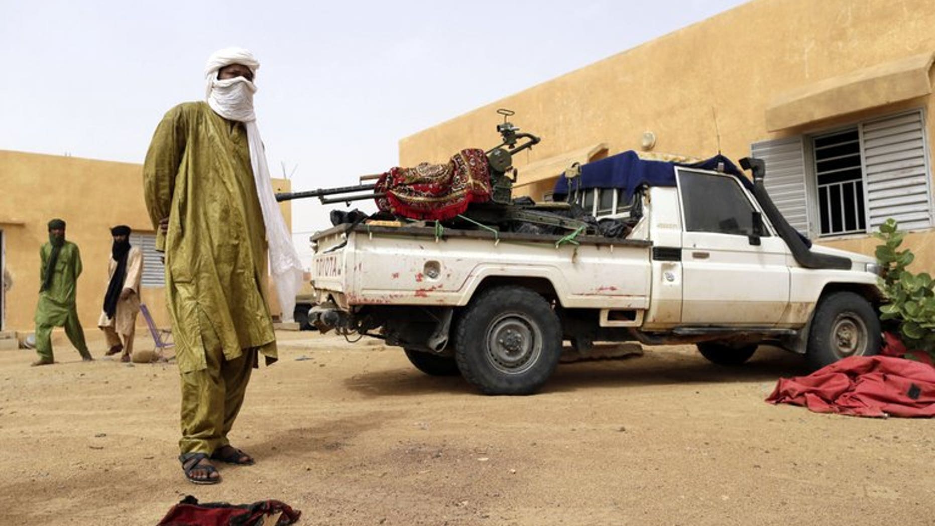 Soldiers of the rebel National Movement for the Liberation of Azawad at their headquarters in Kidal on July 27. Around 100 supporters of Mali's main Tuareg rebel group demonstrated Tuesday in the northern city of Kidal to demand the release of fighters detained in Bamako.