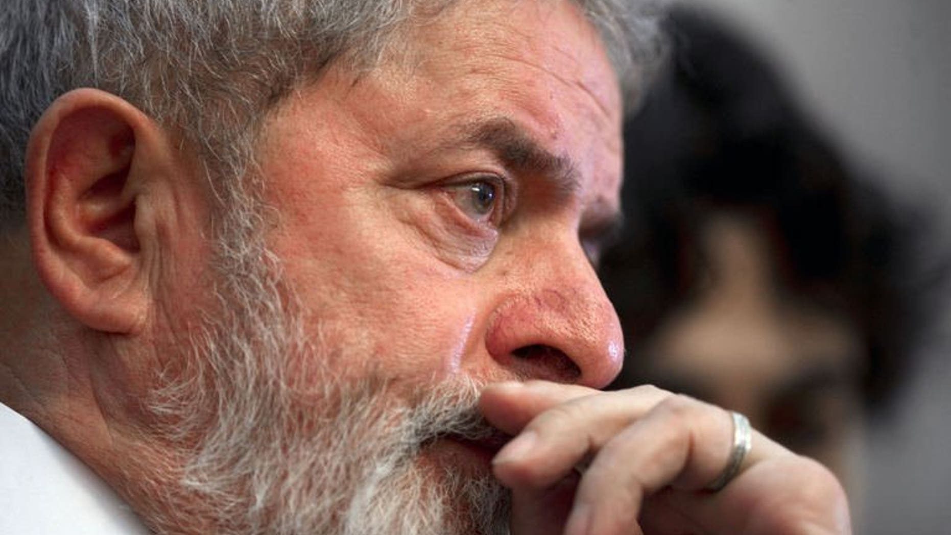 Former Brazilian President Luiz Inacio Lula Da Silva listens to a speech on October 25, 2011, in Mexico City. Lula da Silva was given the all clear here Saturday after tests showed no sign of the throat cancer he was diagnosed with two years ago.
