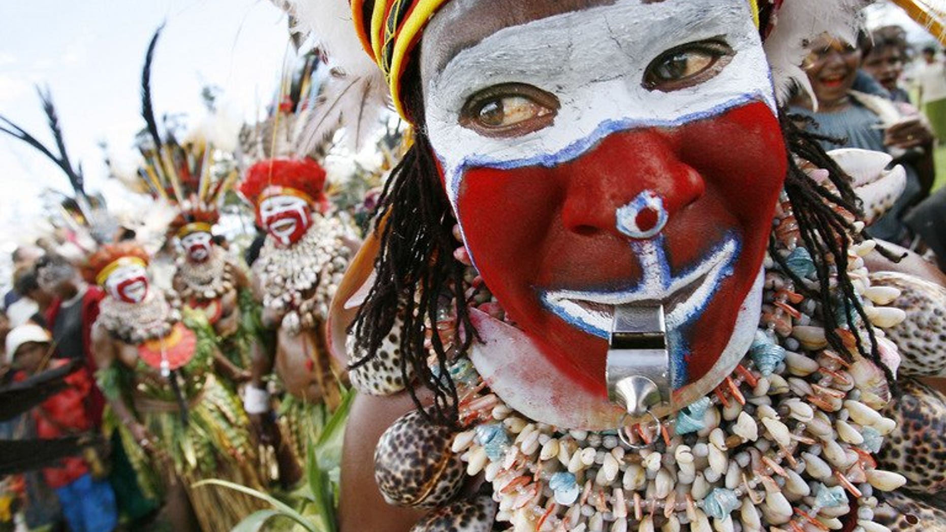 This file illustration photo shows Moki Angimb women performing during a cultural show in Mount Hagen, on August 18, 2007. Women in poverty-stricken Papua New Guinea suffer "severe brutality" with violence, including savage attacks involving knives, axes and whips, occurring in two-thirds of all families, according to a recent study.