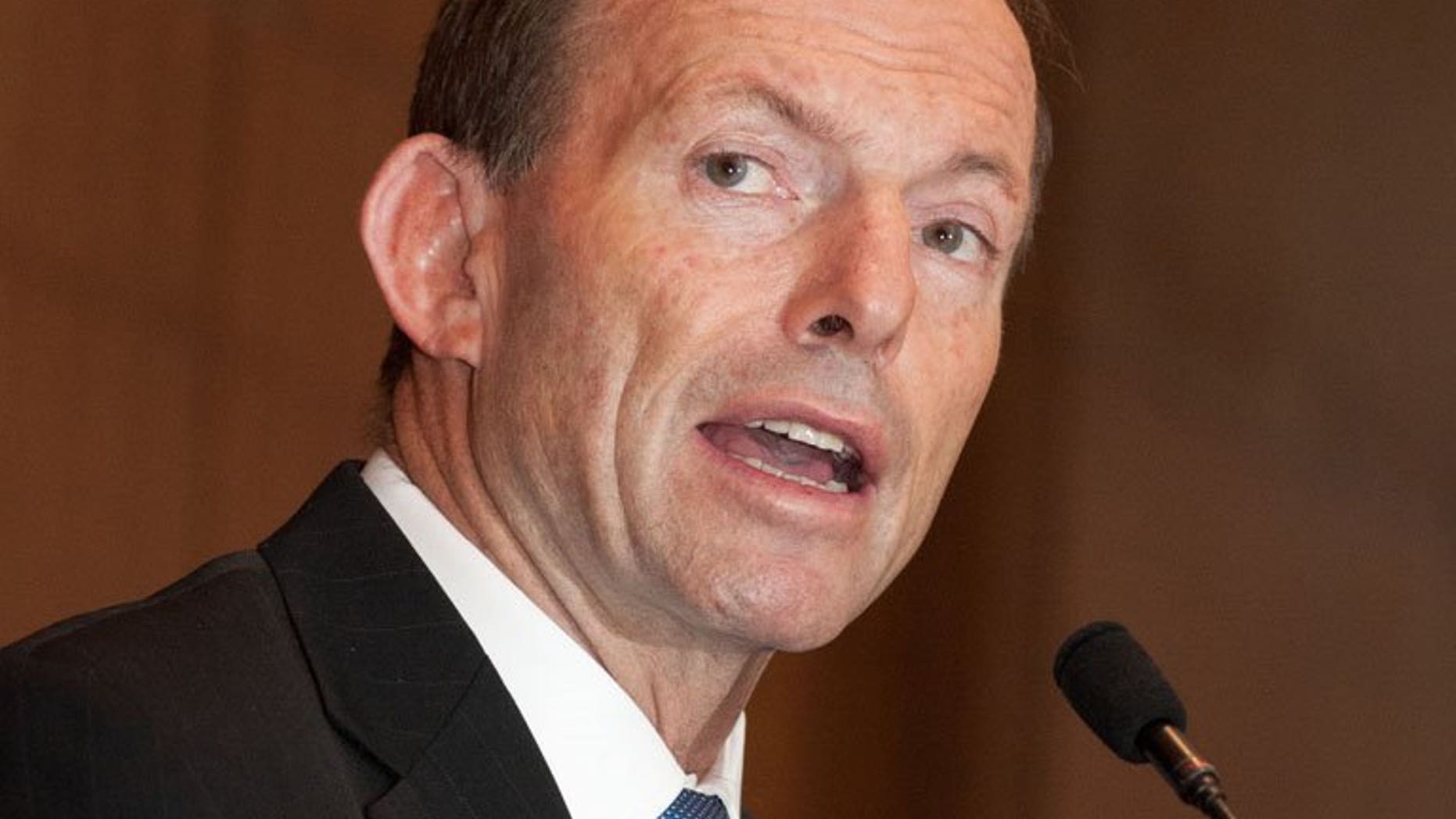 Australian opposition leader Tony Abbott delivers a speech in Beijing, on July 24, 2012. Abbott -- accused last year of misogyny in a blistering speech by then-prime minister Julia Gillard -- is under fire after touting the "sex appeal" of an election candidate.